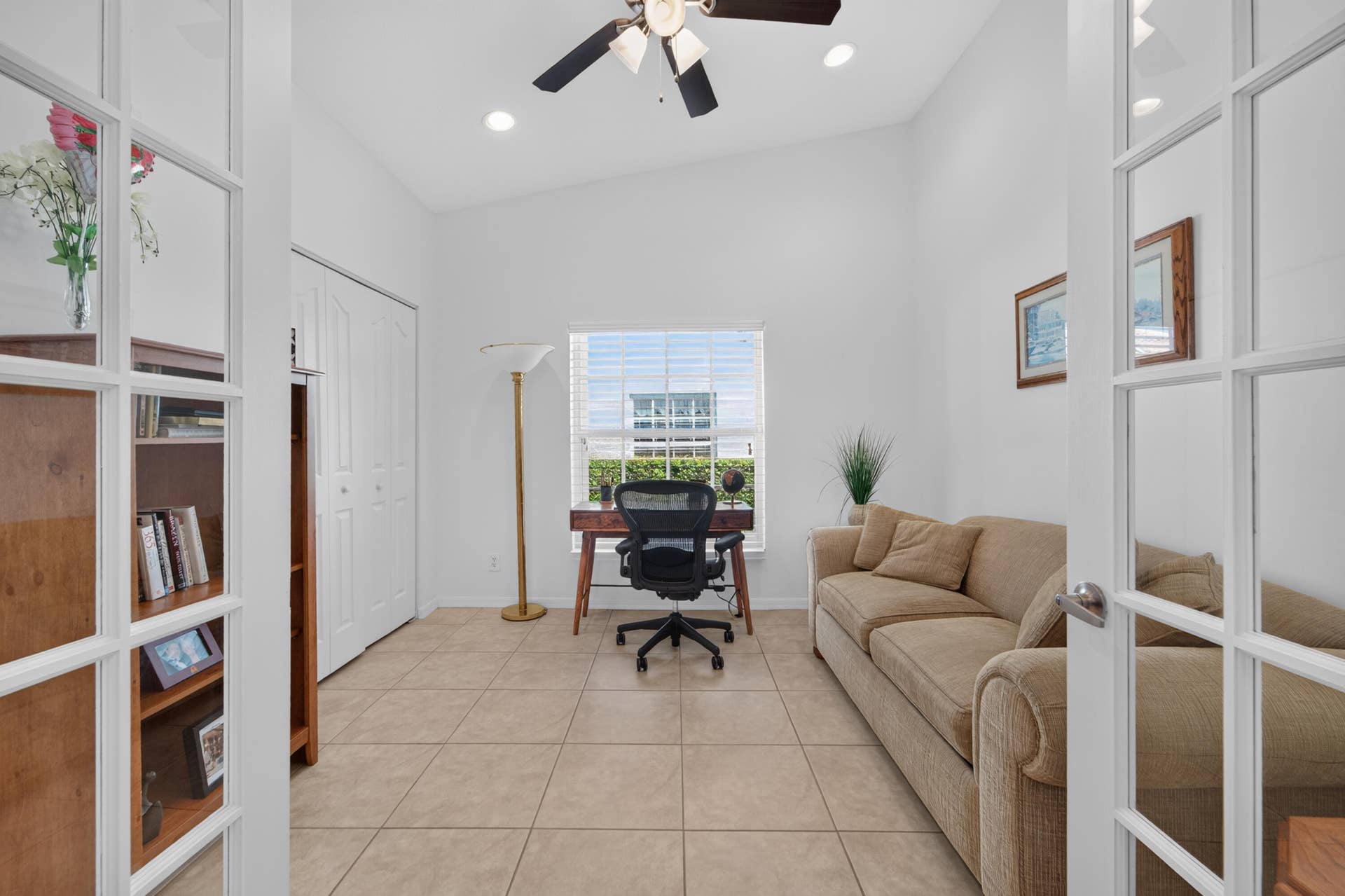 8116 Cormyour Way, Boynton Beach, FL 33472 3rd bedroom being used as a office, pull out couch, vaulted ceilings, fan, recess lighting.