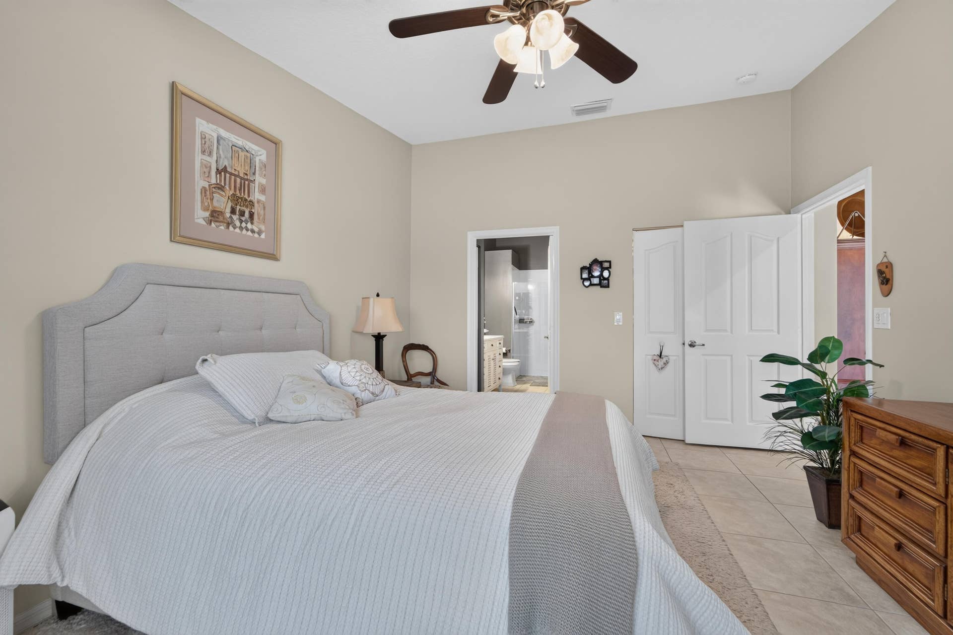 8116 Cormyour Way, Boynton Beach, FL 33472 Primary suite has separate bath and huge walk in closet with organized shelves