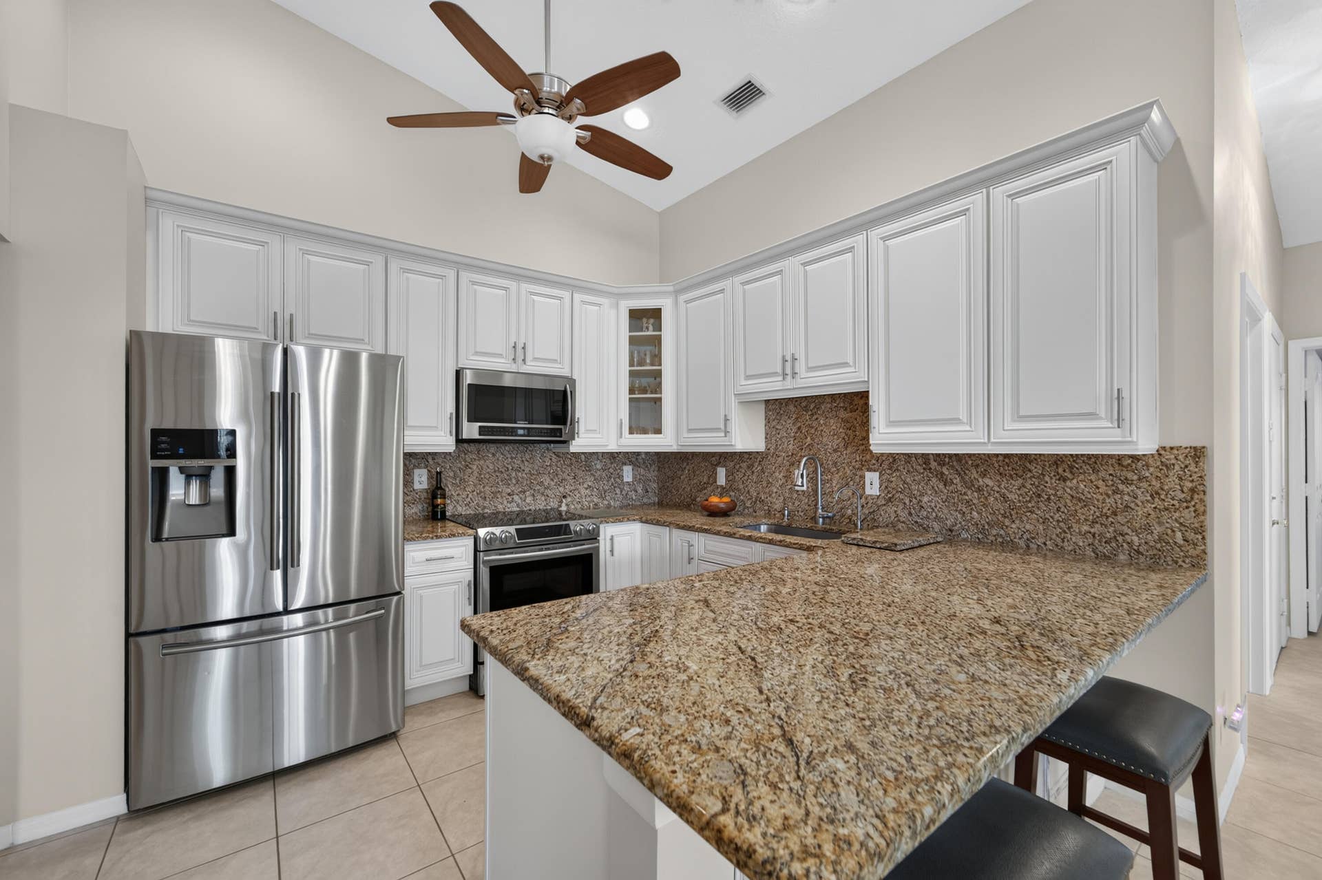 8116 Cormyour Way, Boynton Beach, FL 33472 Recess lighting and vaulted ceilings give this home a spacious feeling