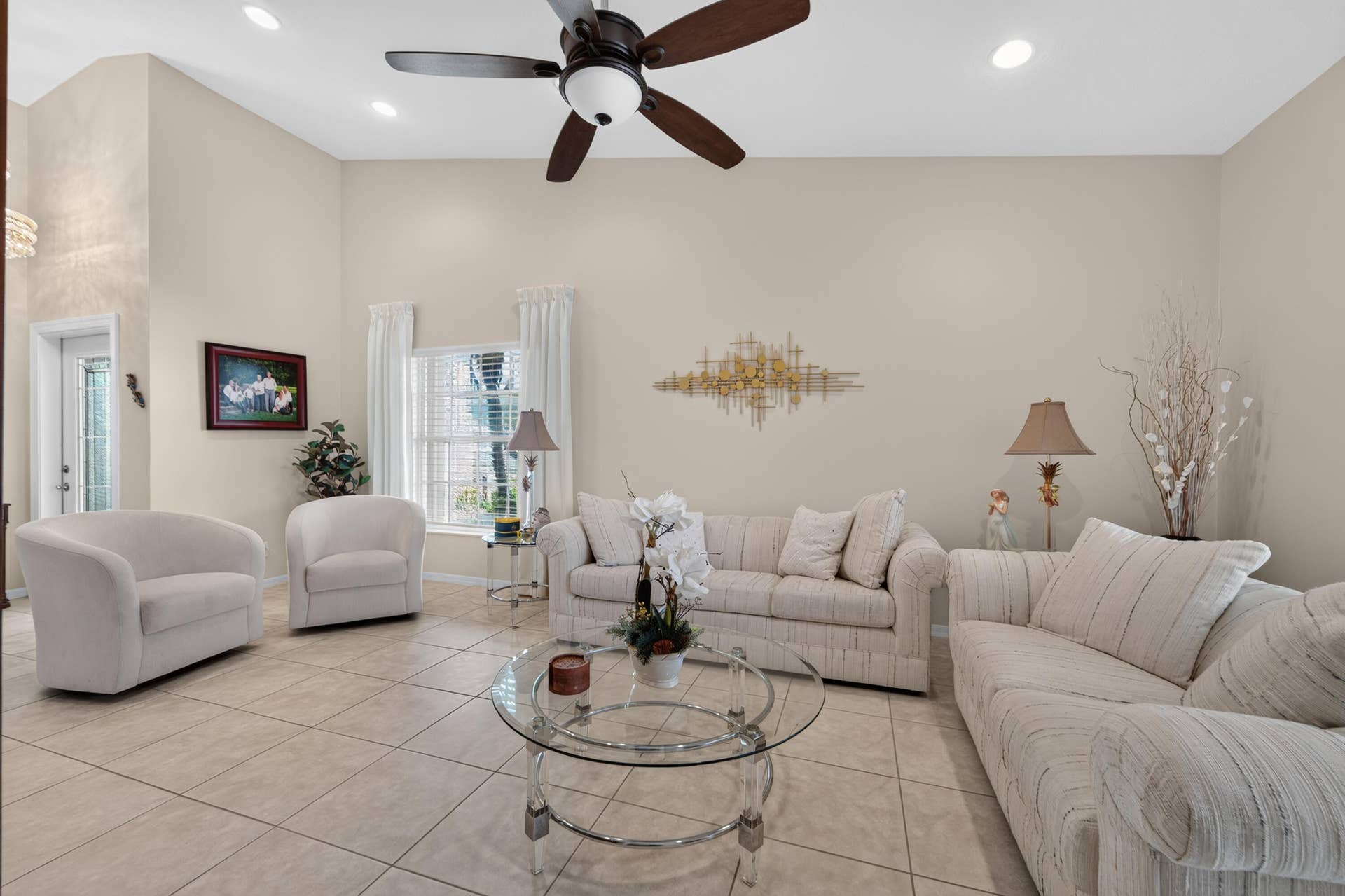 8116 Cormyour Way, Boynton Beach, FL 33472 Large Vaulted family room with recess lighting, ceiling fan, blinds and custom drapes.