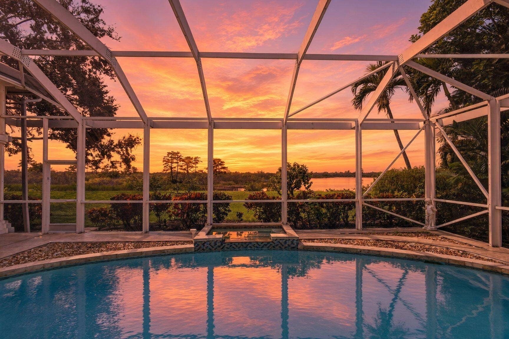 42 Windward Isle, Palm Beach Gardens, FL 33418 EVENINGS BY THE POOL