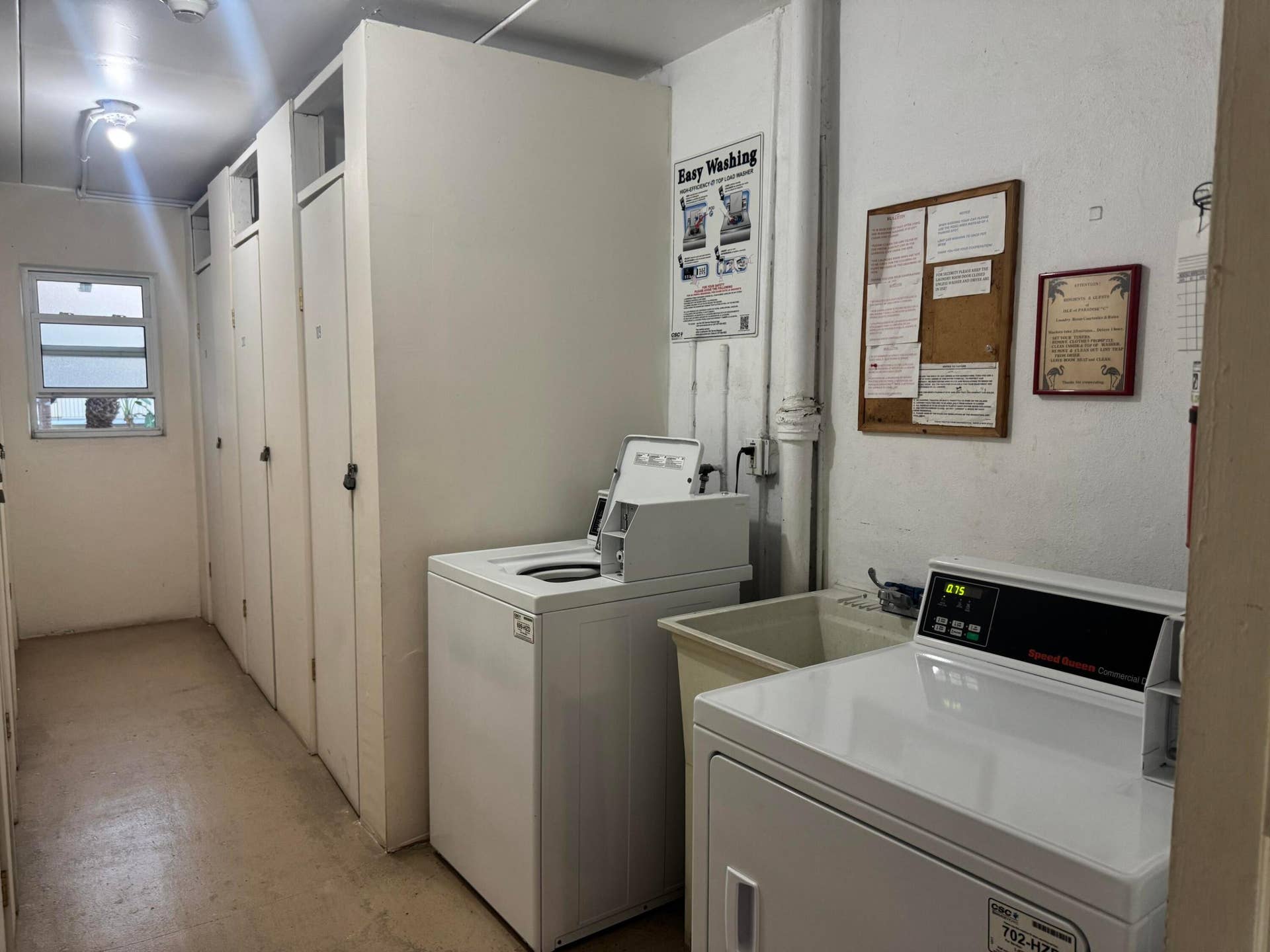 STORAGE BIN AND LAUNDRY ROOM ON THE 2ND FLOOR