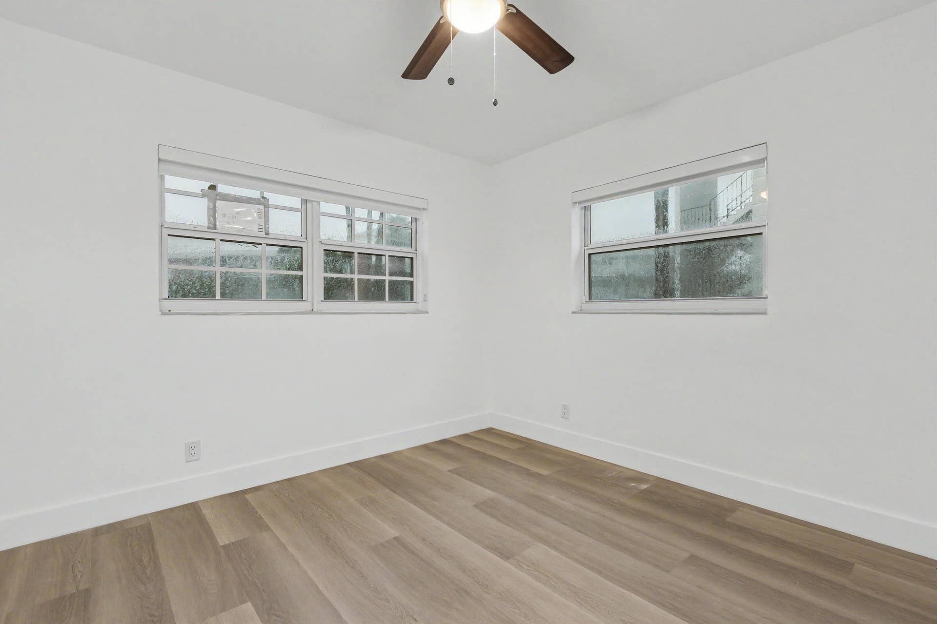 GUEST BEDROOM WITH IMPACT WINDOWS