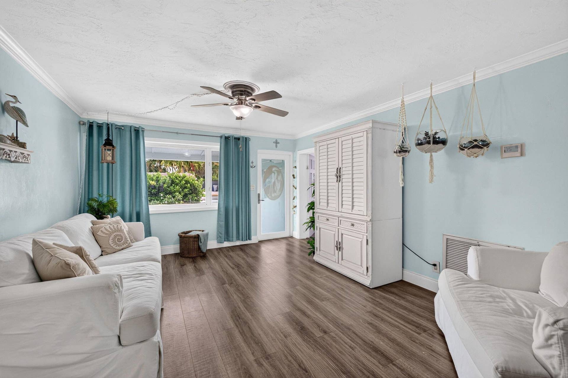 View of front door from dining room