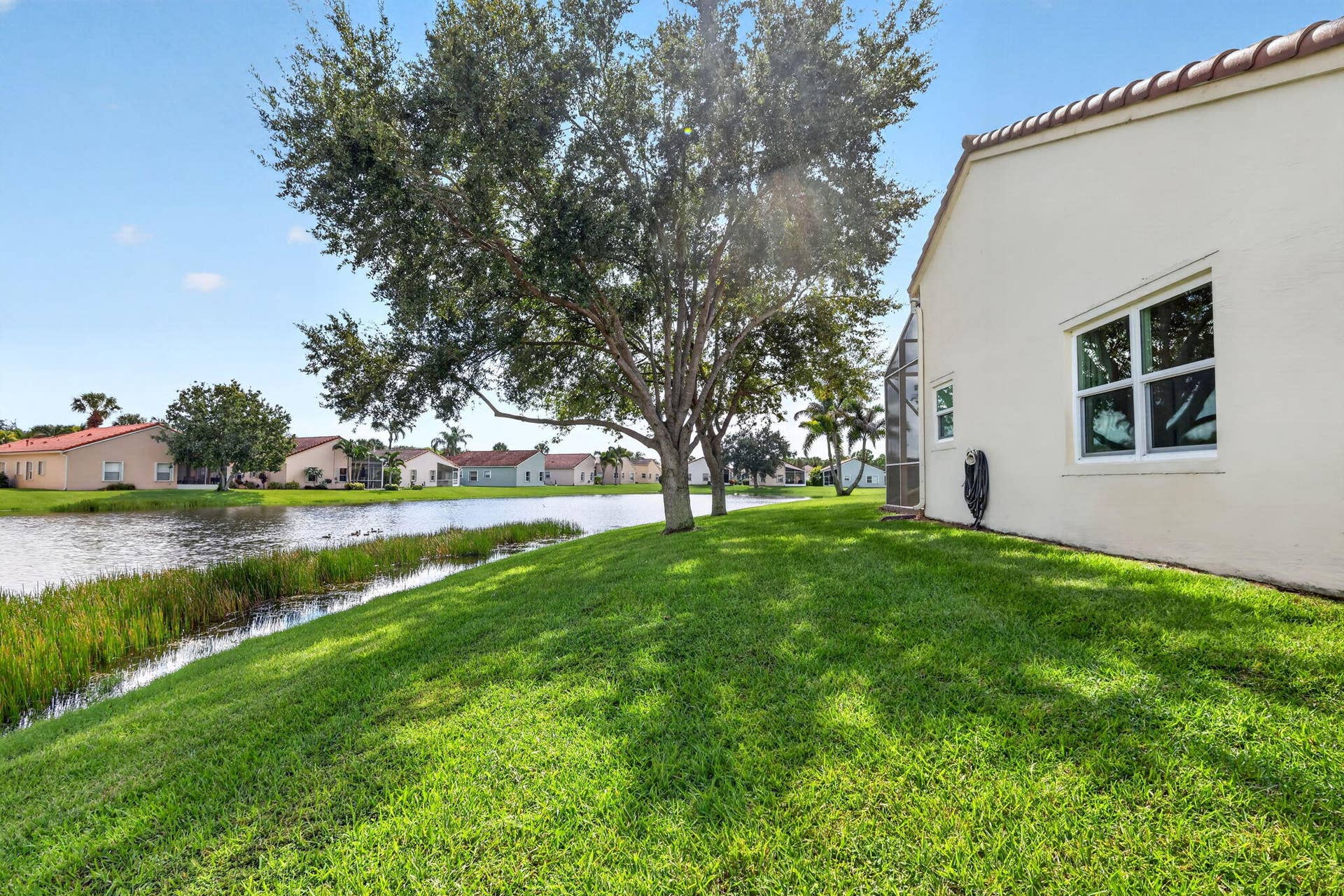 109 NW BAYCREST Court, Port St Lucie, FL 34986 Lake and Backyard