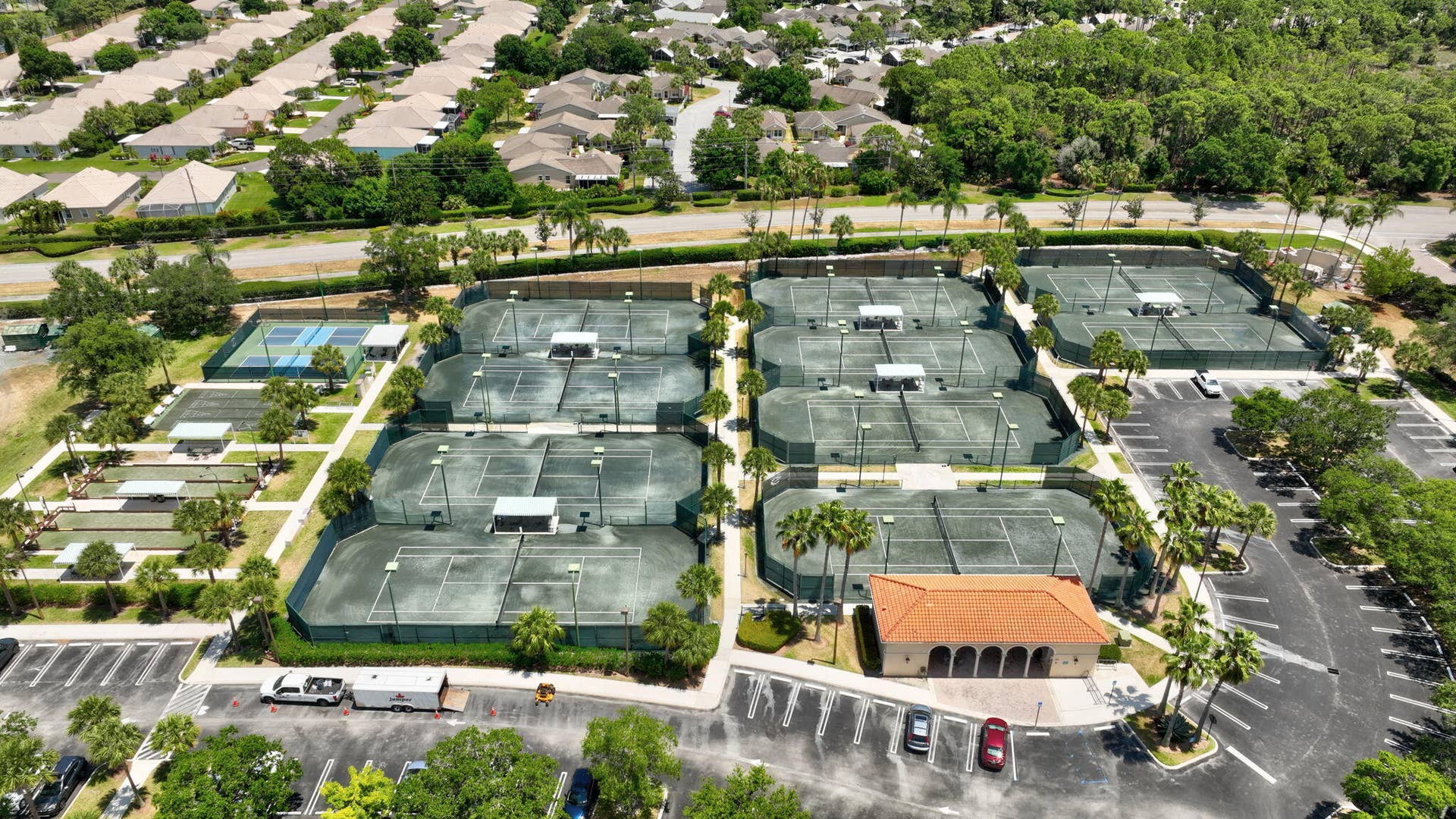 109 NW BAYCREST Court, Port St Lucie, FL 34986 10 Tennis Courts Aerial View