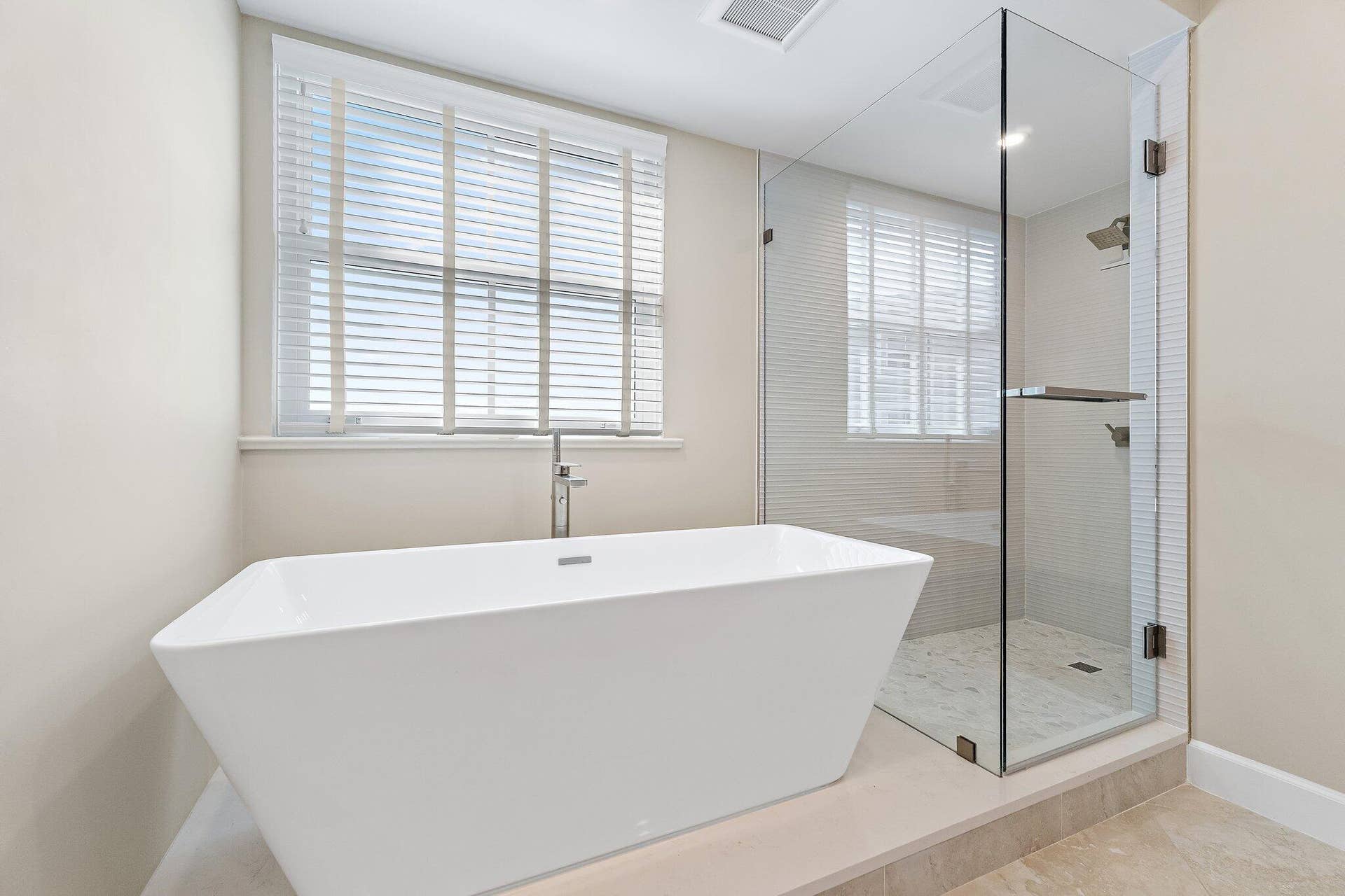 Soaking Tub & Frameless Glass Shower