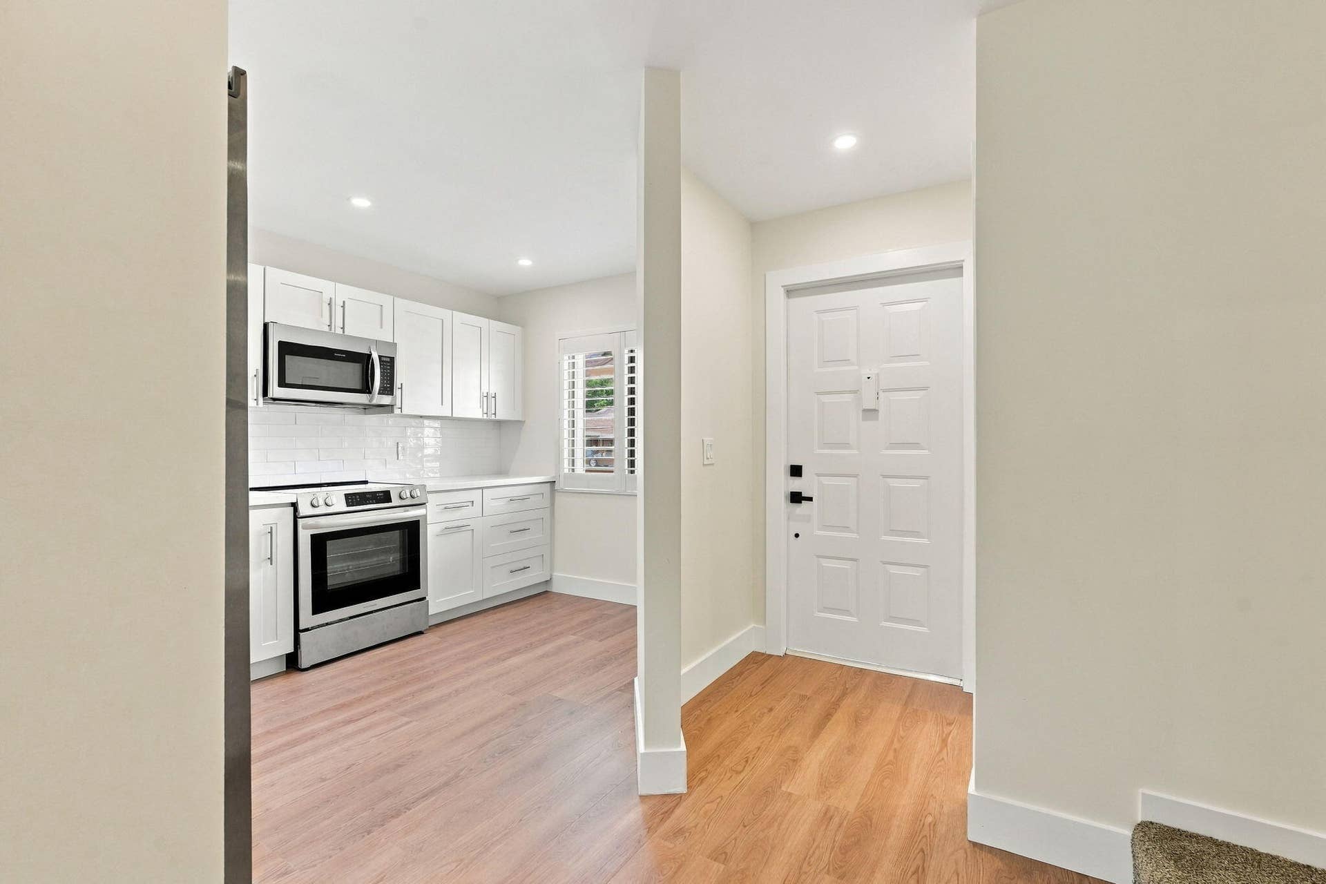 2641 Gately Drive W, #906, West Palm Beach, FL 33415 Front door / Kitchen