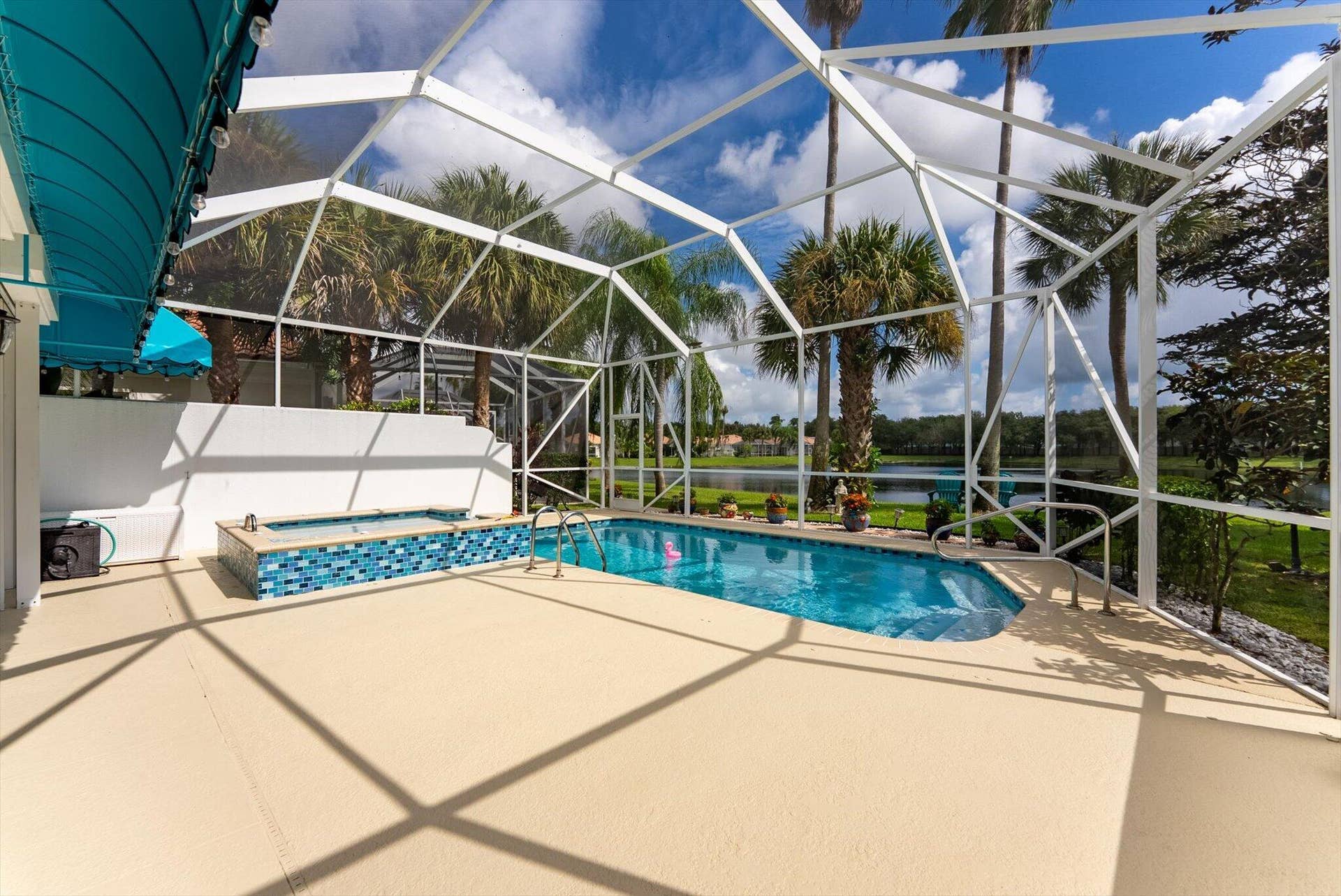 2067 Valencia Drive, Delray Beach, FL 33445 Pool + Spa with Lake Views