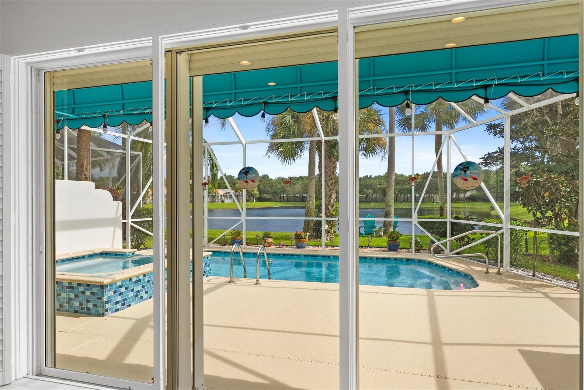 2067 Valencia Drive, Delray Beach, FL 33445 Pool + Spa with Lake Views