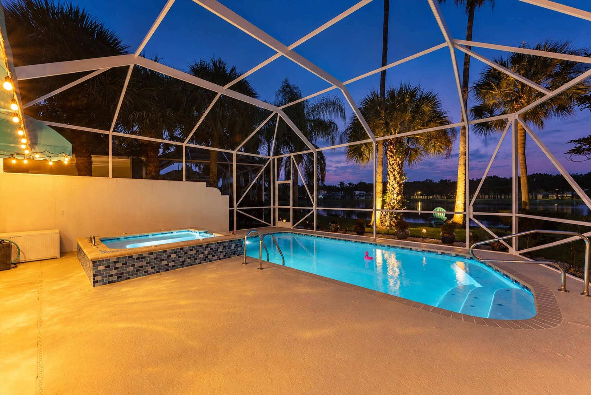 2067 Valencia Drive, Delray Beach, FL 33445 Twilight Pool + Spa with Lake Views