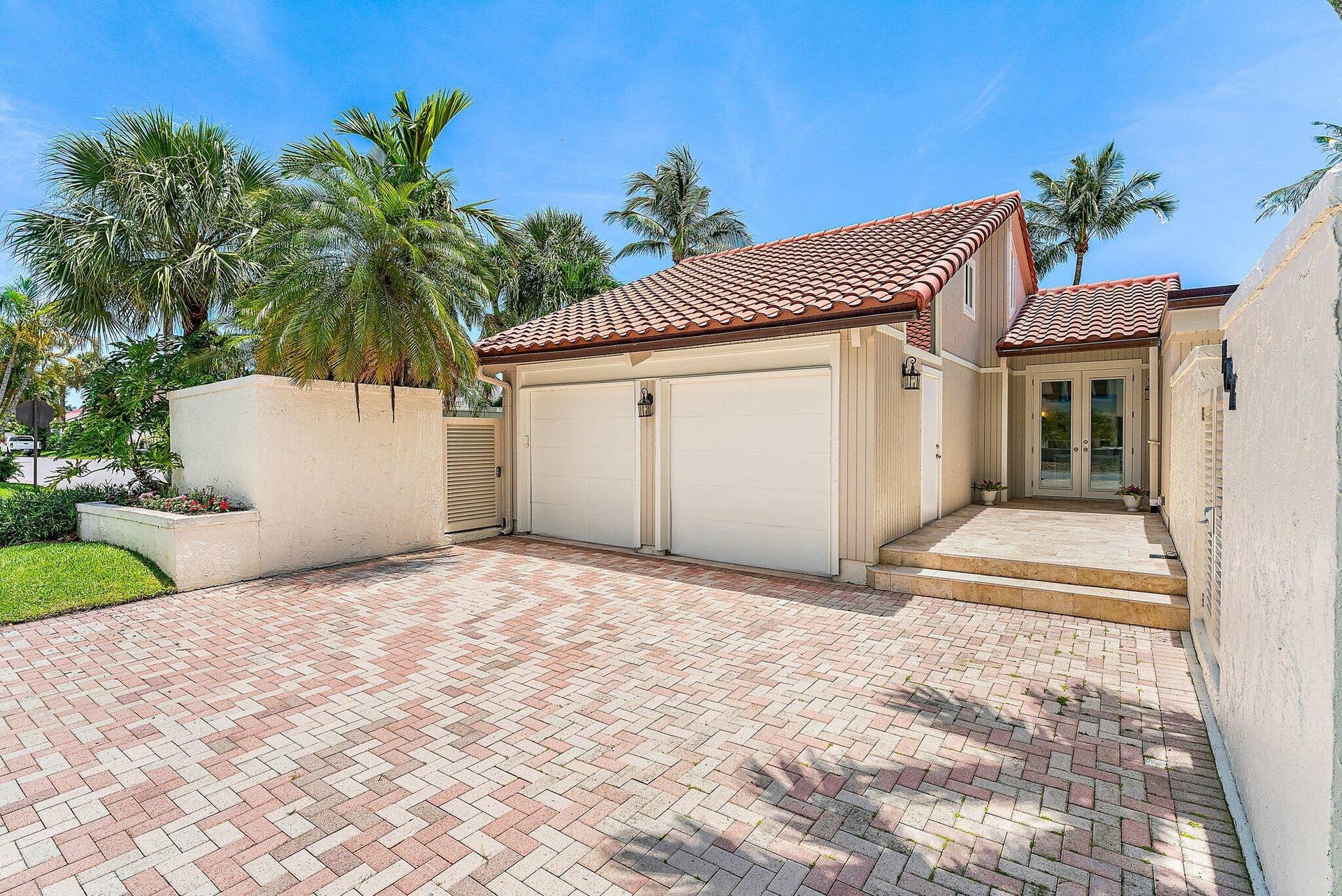 Large driveway with 2 car garage
