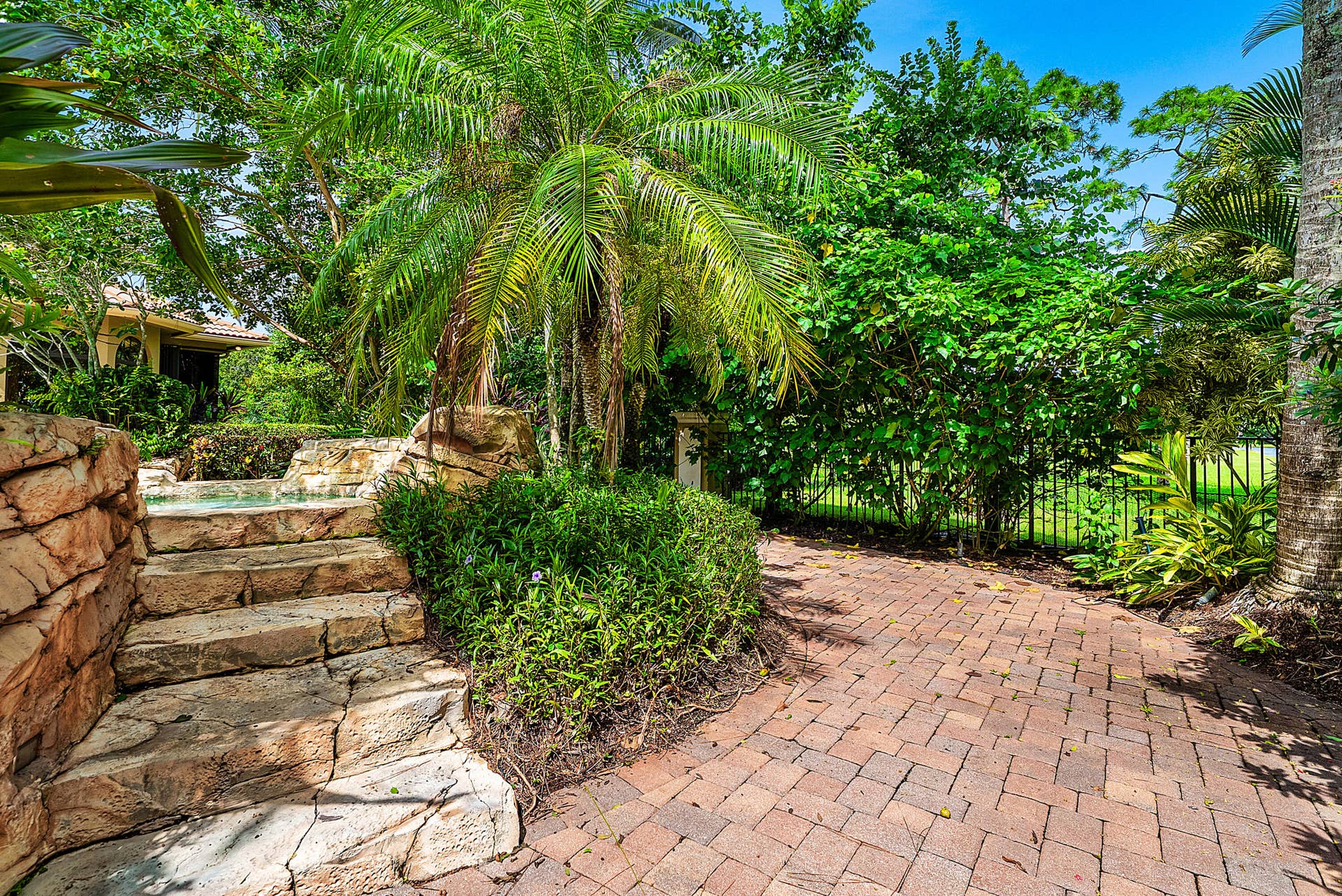 7730 Woodsmuir Drive, West Palm Beach, FL 33412 Hidden Steps to Hot Tubs & Waterfall