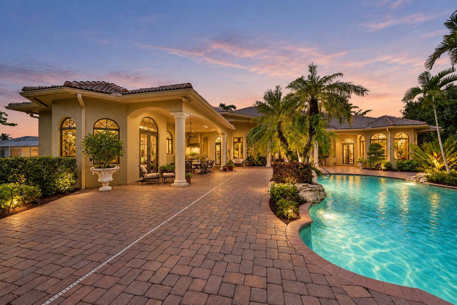 7730 Woodsmuir Drive, West Palm Beach, FL 33412 Pool with Warm Landscape Lighting