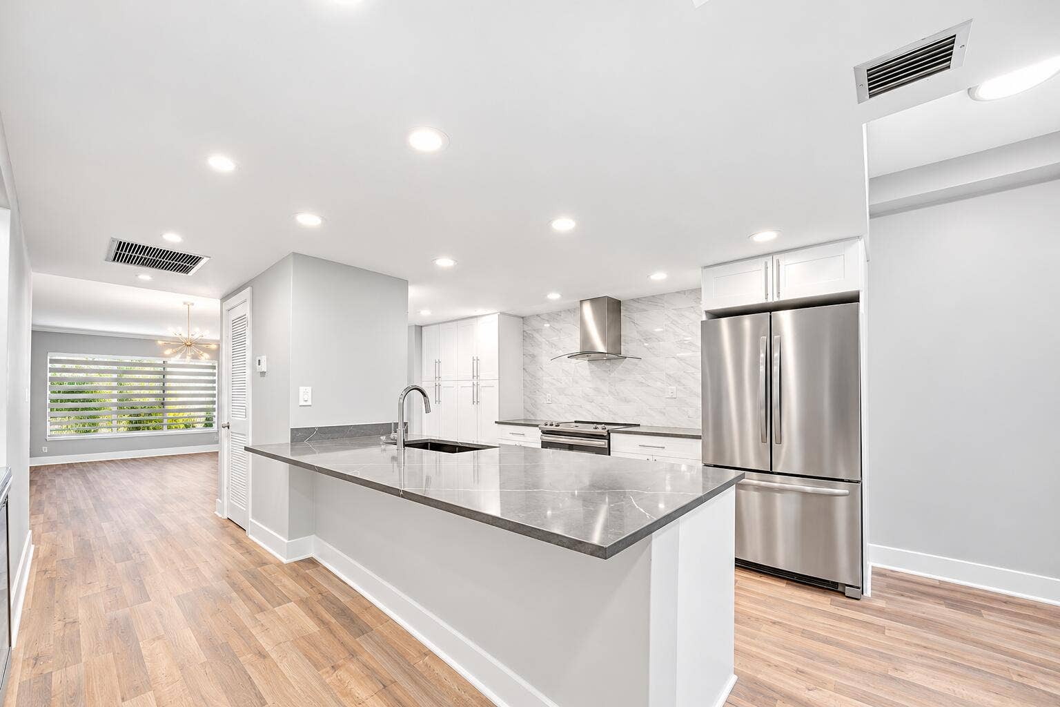 730 GREENSWARD Court, #108-J, Delray Beach, Delray Beach, FL 33445 Modern Open-Concept Kitchen and Living S