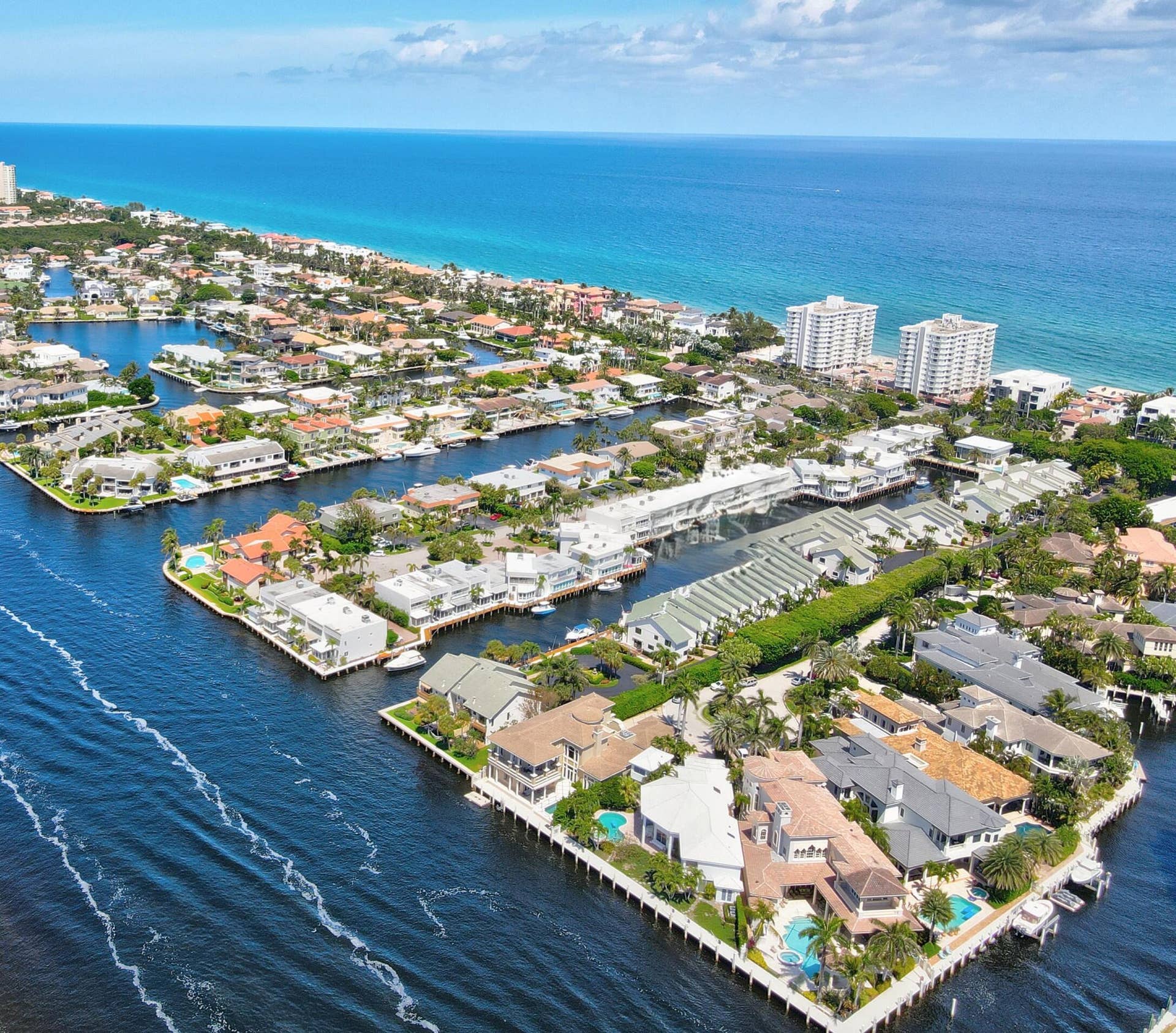 1127 BOCA COVE Lane, Highland Beach, FL 33487 Waterfront properties featuring private docks, direct ocean access, and individual swimming pools