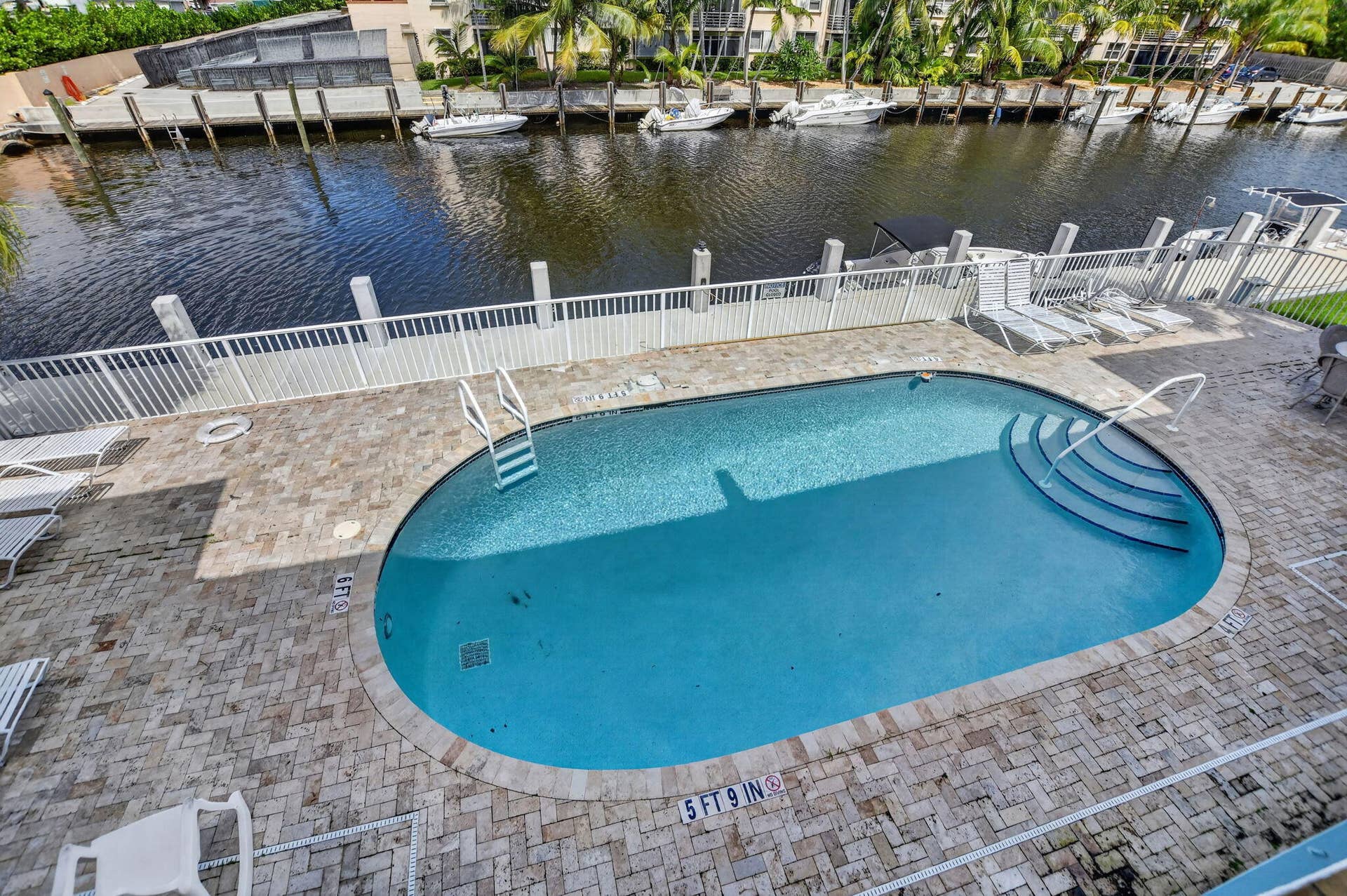 2107 NE 44th Street, Lighthouse Point, FL 33064 Master BR View of Pool & Canal