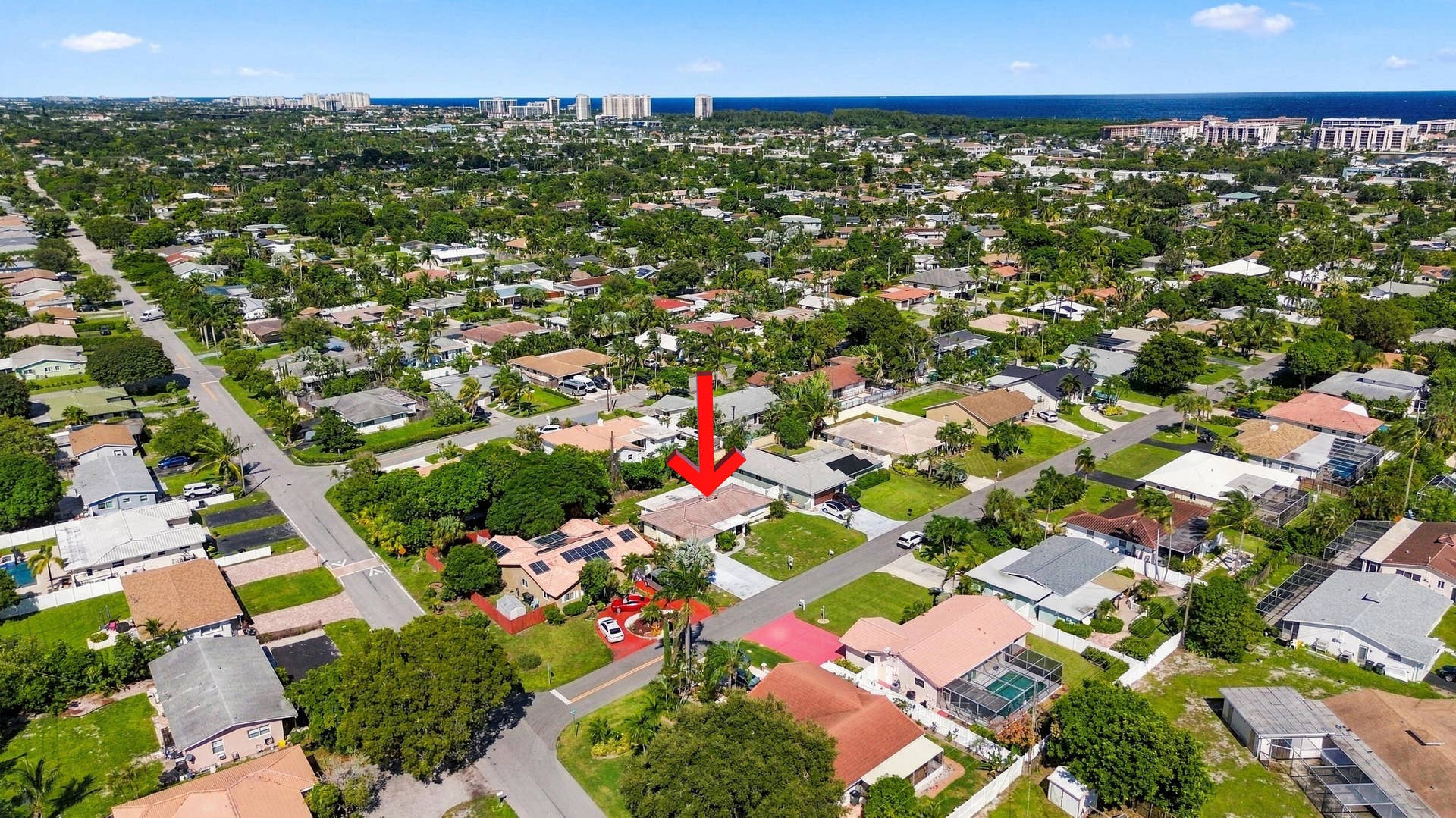 213 NE 24th Court, Boca Raton, FL 33431 Minutes from both the Atlantic Ocean and Minzer Park, this home offers a truly unrivaled lifestyle.