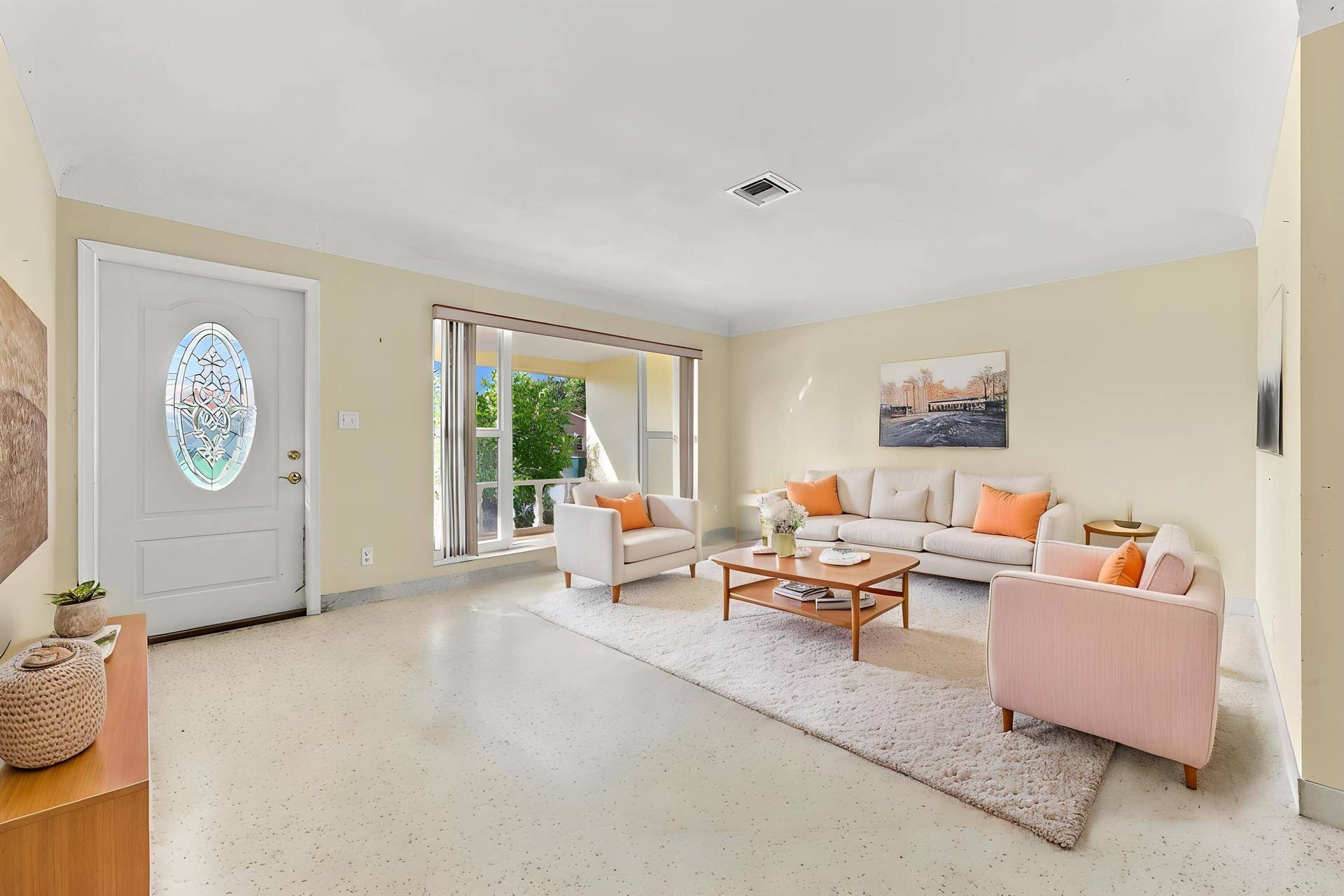 213 NE 24th Court, Boca Raton, FL 33431 The versatile floor plan offers a living room, family room, and sunroom.