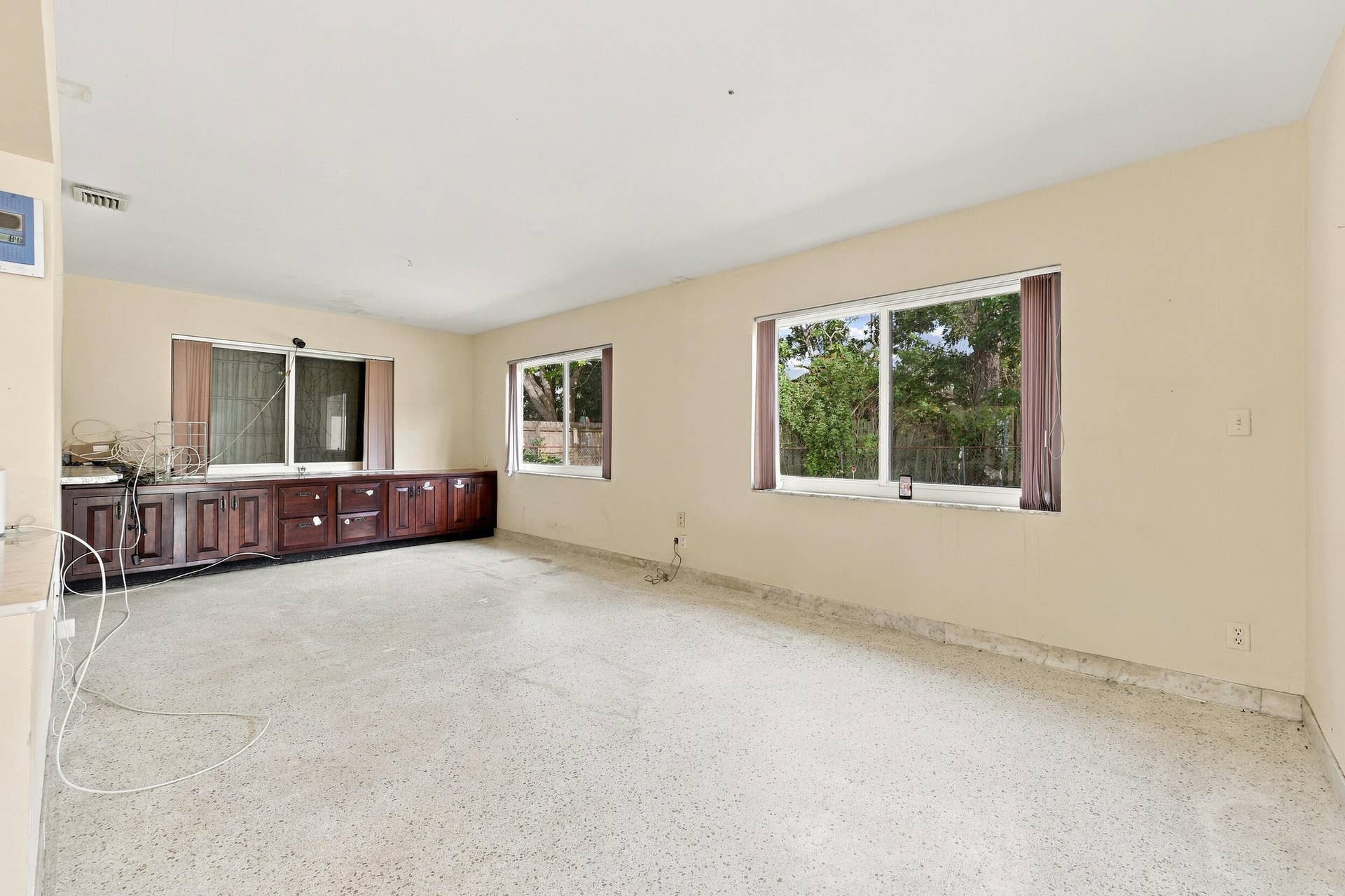 213 NE 24th Court, Boca Raton, FL 33431 The generous-sized family room offers a great space for the entire family. It can be used as a secondary living room, theater room, office, or bonus room for all of the kids.