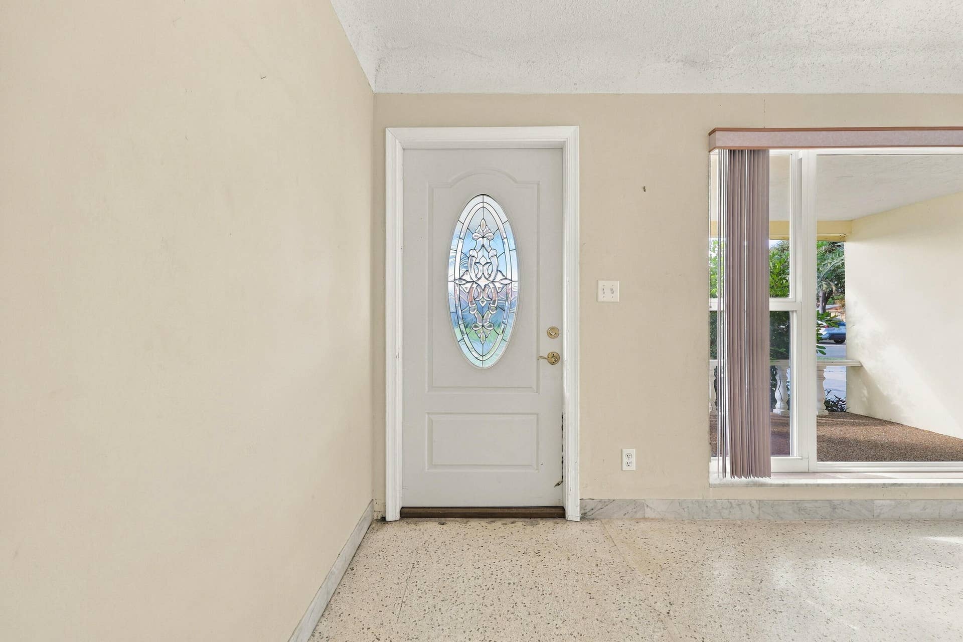 213 NE 24th Court, Boca Raton, FL 33431 As you enter, you are greeted by a large open floor plan and lots of natural light coming through the hurricane impact windows.
