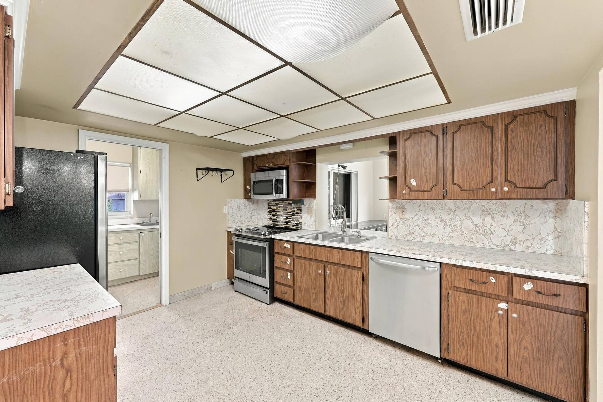213 NE 24th Court, Boca Raton, FL 33431 The kitchen of your dream awaits in this blank slate of a home.
