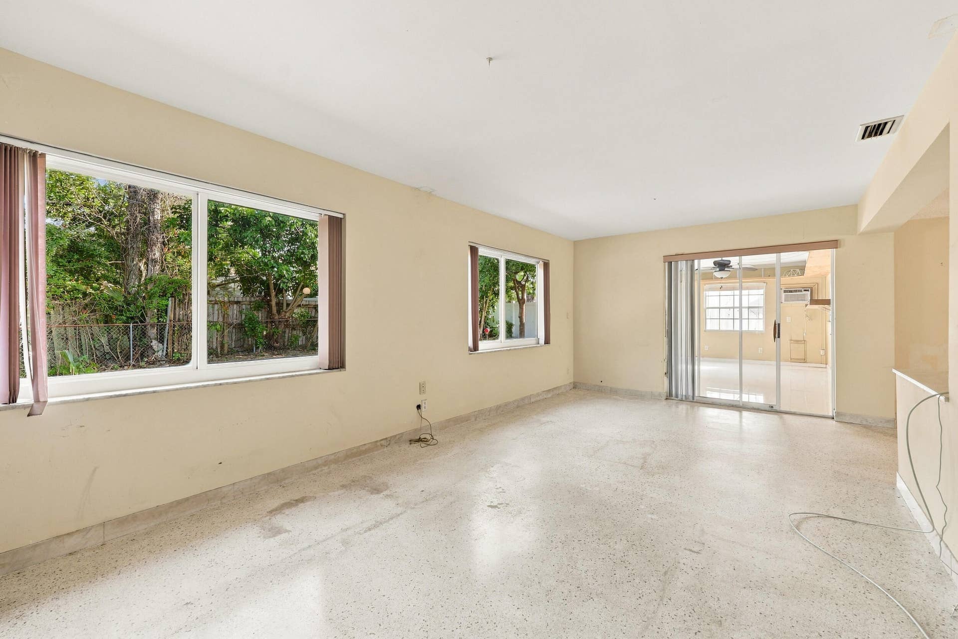 213 NE 24th Court, Boca Raton, FL 33431 The generous-sized family room offers a great space for the entire family. It can be used as a secondary living room, theater room, office, or bonus room for all of the kids.