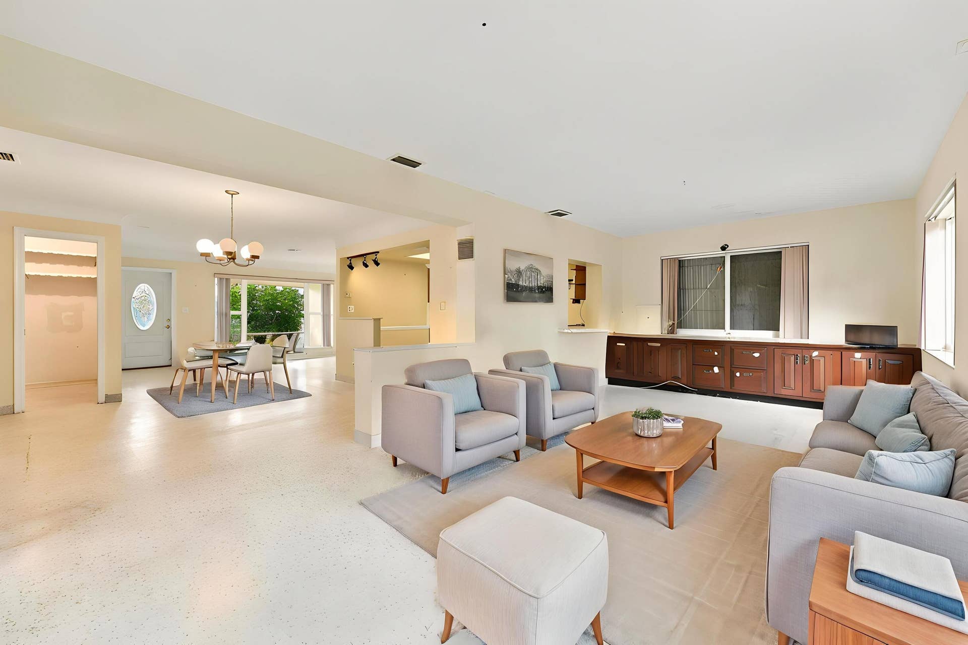 213 NE 24th Court, Boca Raton, FL 33431 The versatile floor plan offers a living room, family room, and sunroom.