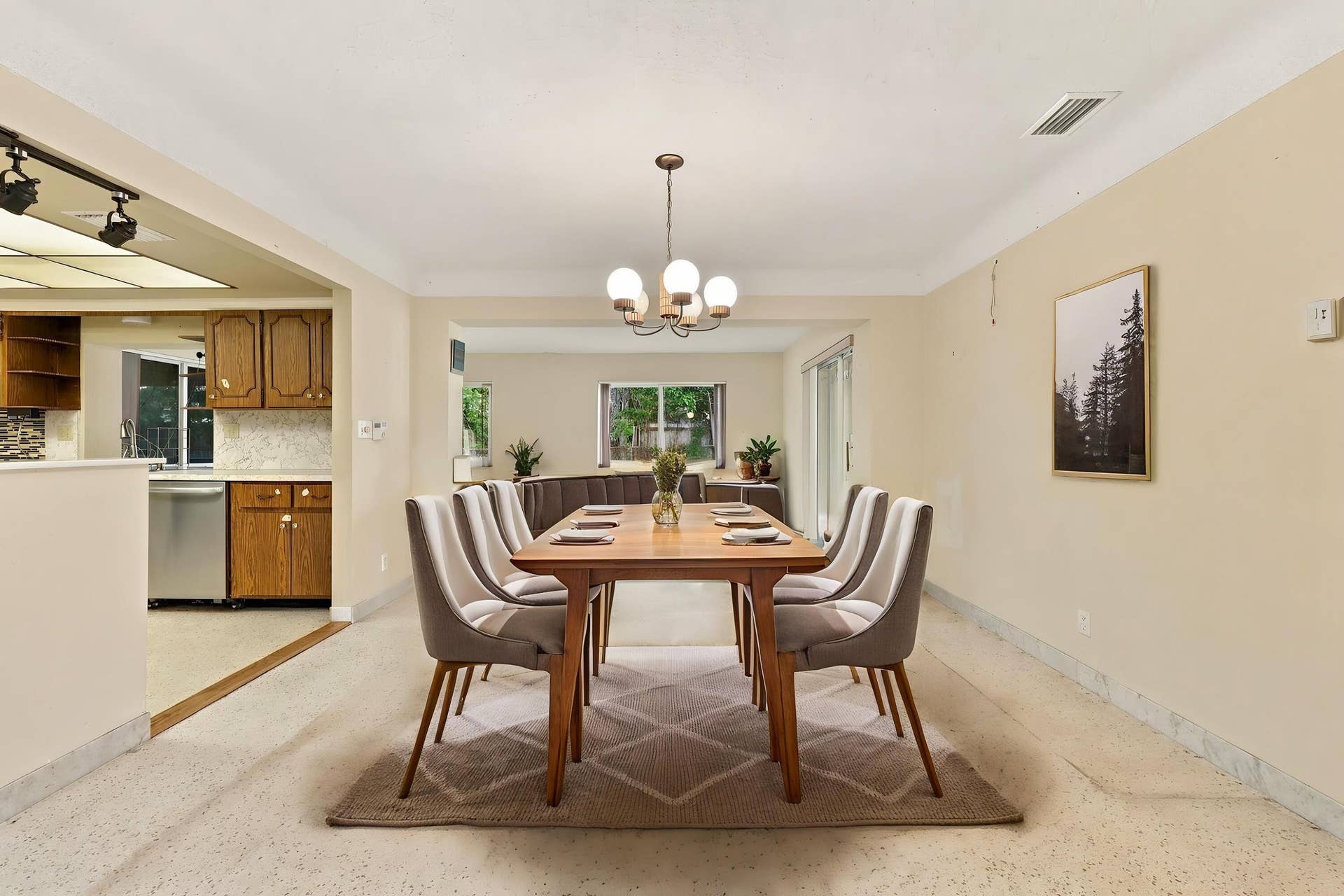 213 NE 24th Court, Boca Raton, FL 33431 The versatile floor plan offers a living room, family room, and sunroom.