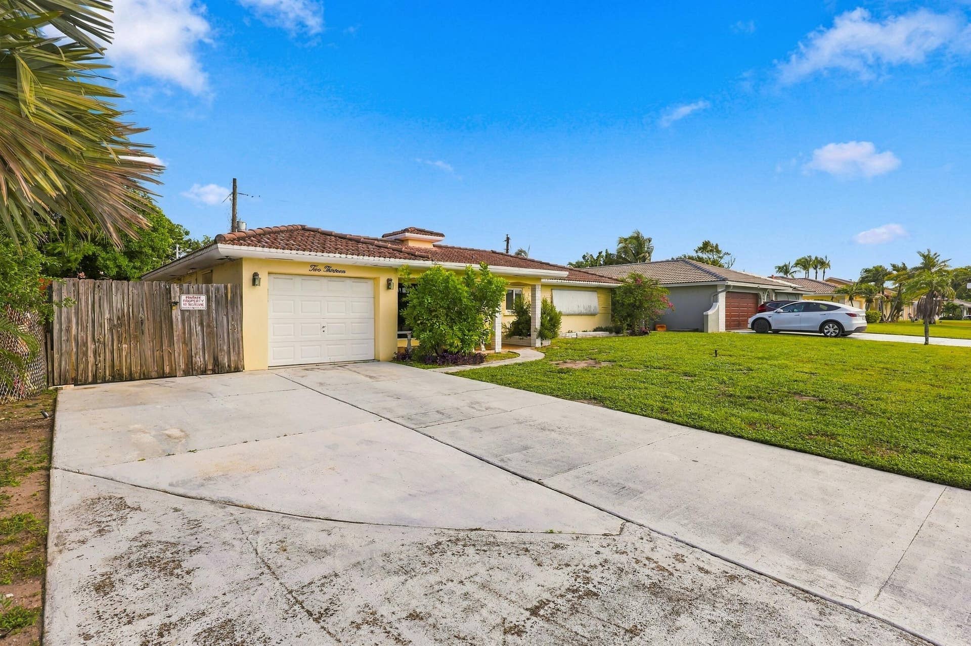 213 NE 24th Court, Boca Raton, FL 33431 The expanded driveway and fully fenced-in backyard give you plenty of space for all of your toys. Bring your boat, camper, or RV!