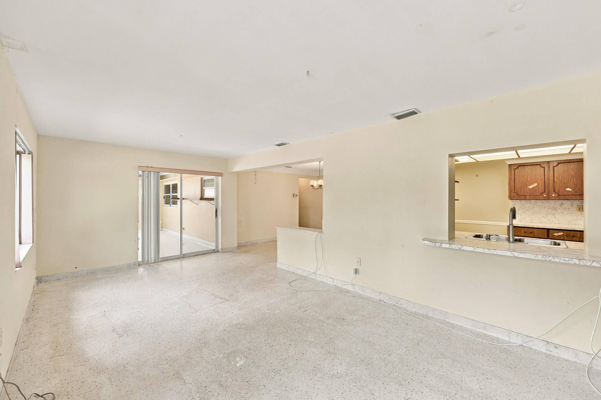 213 NE 24th Court, Boca Raton, FL 33431 The generous-sized family room offers a great space for the entire family. It can be used as a secondary living room, theater room, office, or bonus room for all of the kids.