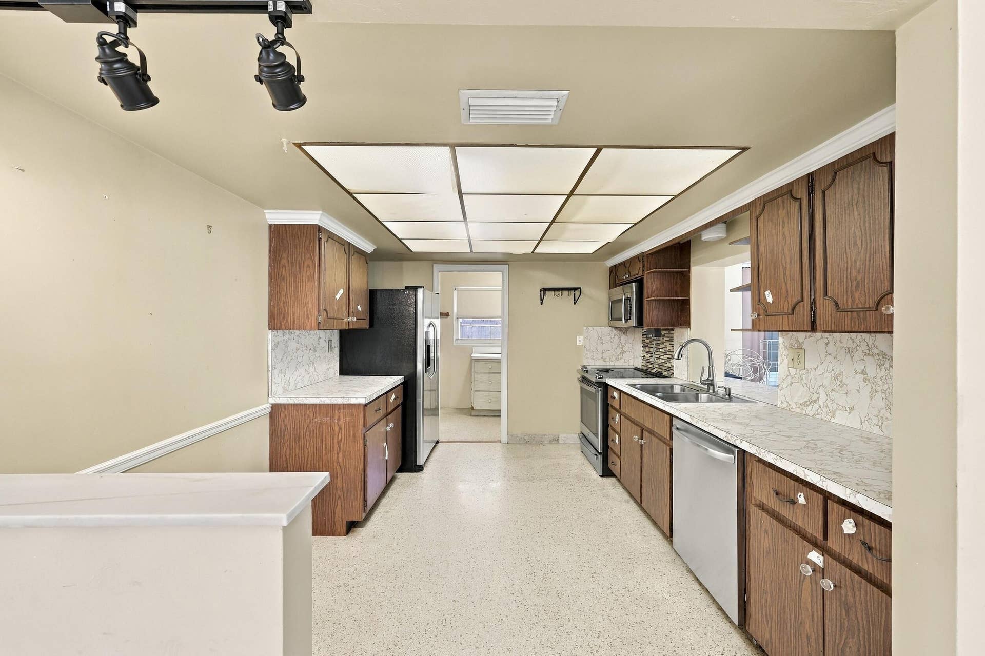 213 NE 24th Court, Boca Raton, FL 33431 The kitchen of your dream awaits in this blank slate of a home.