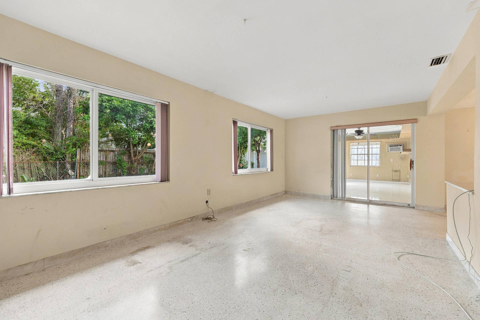 213 NE 24th Court, Boca Raton, FL 33431 The generous-sized family room offers a great space for the entire family. It can be used as a secondary living room, theater room, office, or bonus room for all of the kids.