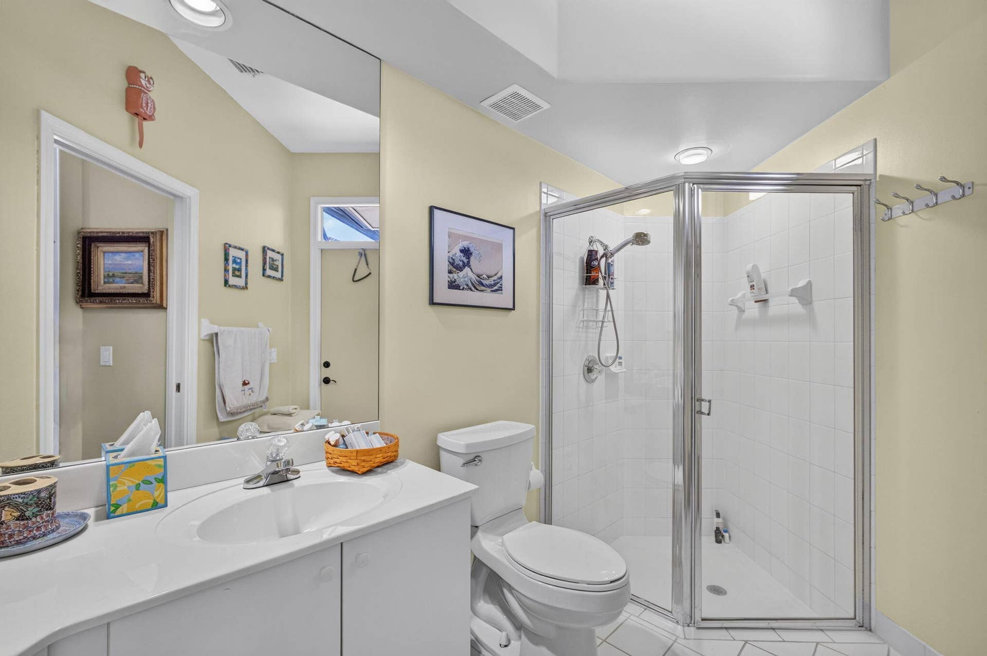 8863 LAKES Boulevard, West Palm Beach, FL 33412 Doubles as cabana bath for courtyard.