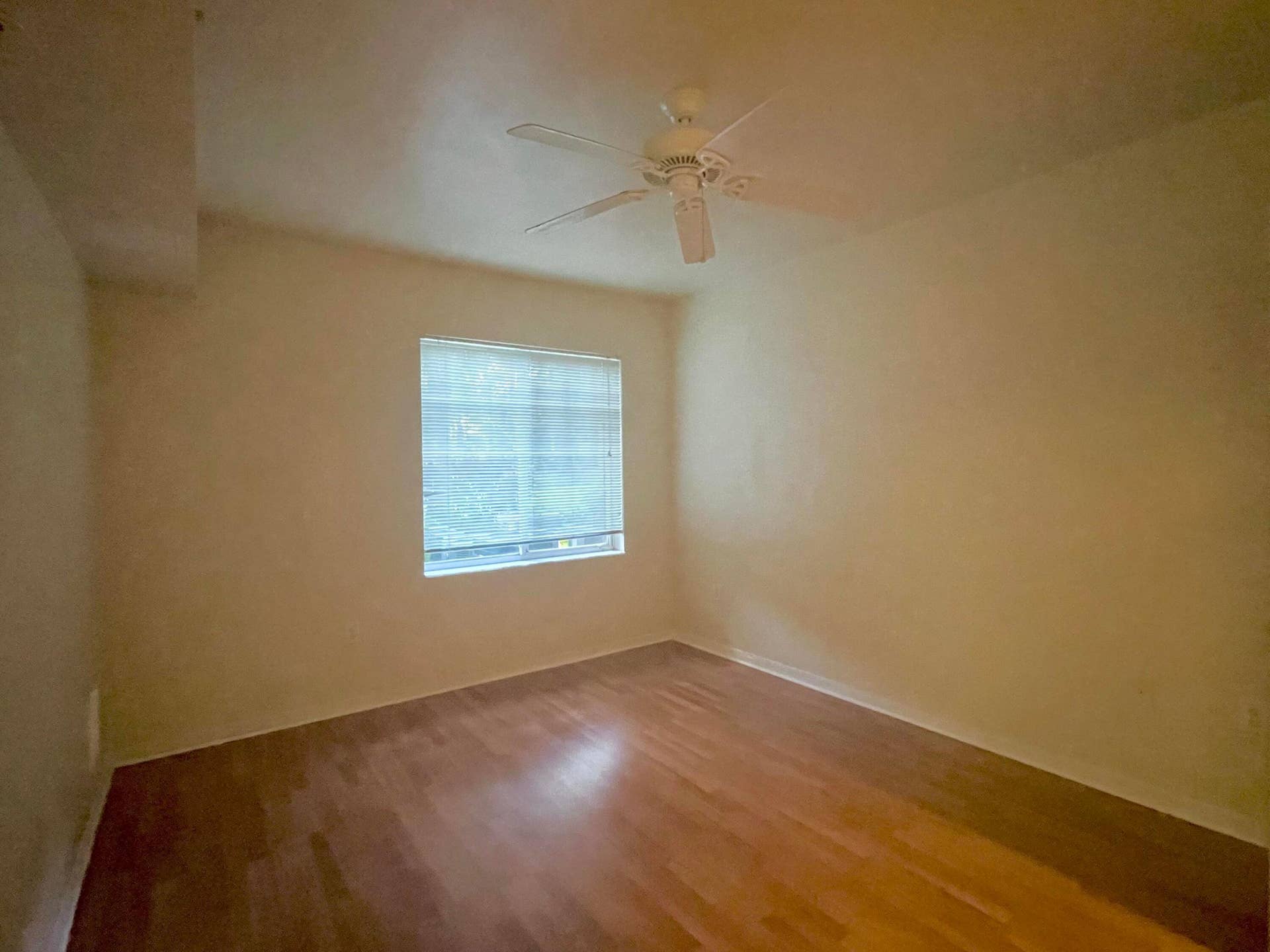 6533 EMERALD DUNES Drive, #107, West Palm Beach, West Palm Beach, FL 33411 bedroom w/ laminate floor