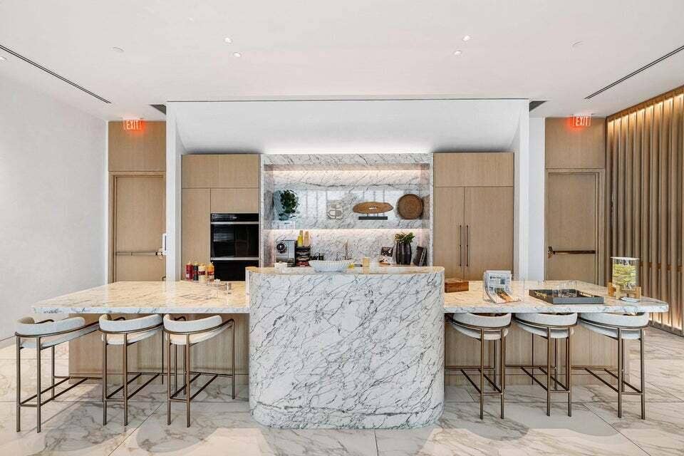 900 N OCEAN Boulevard, #1204, Pompano Beach, FL 33062 Casamar Stunning Kitchen w/ Bar for cocktails before the beach.