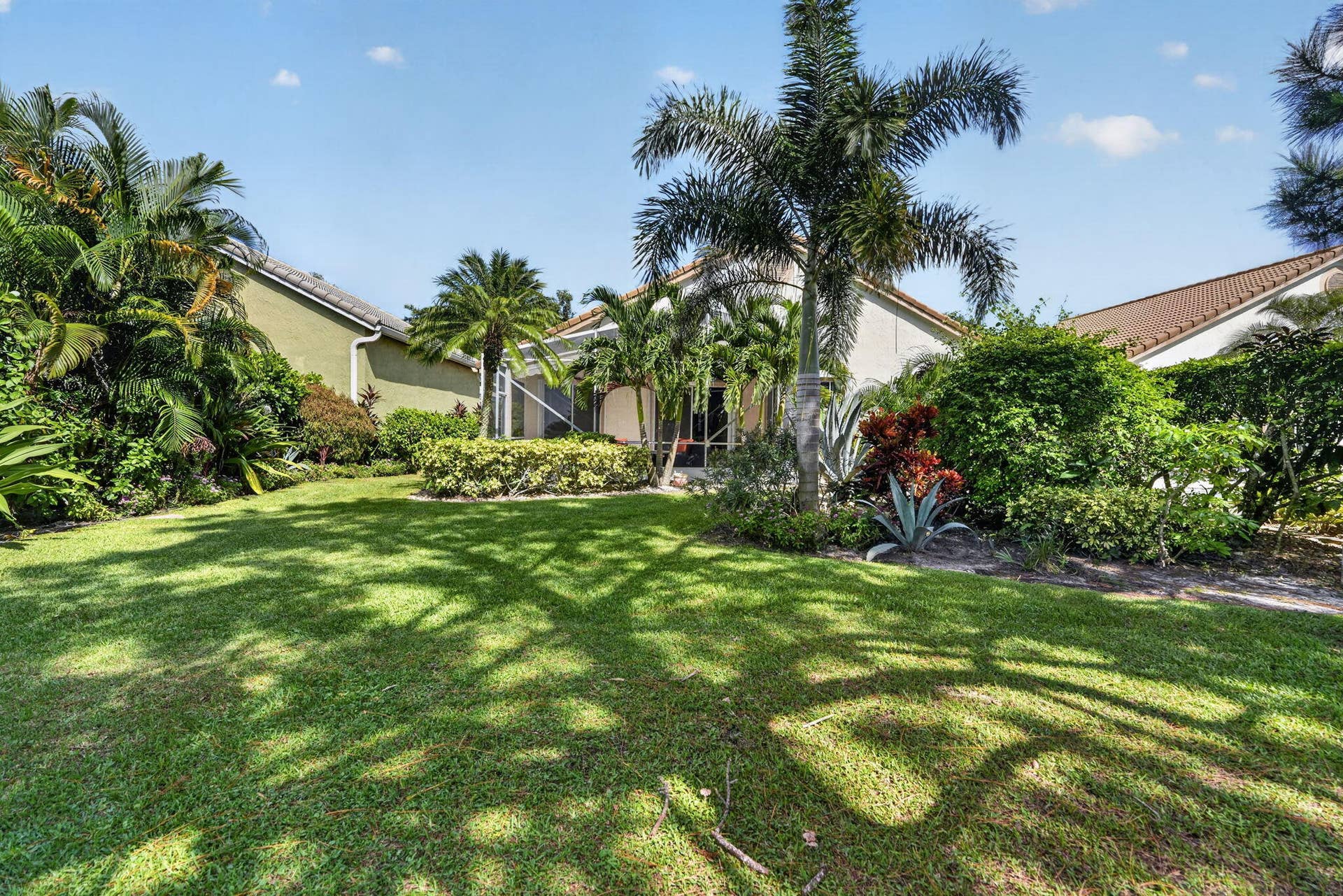 12850 Oak Knoll Drive, Palm Beach Gardens, FL 33418 back oak knoll