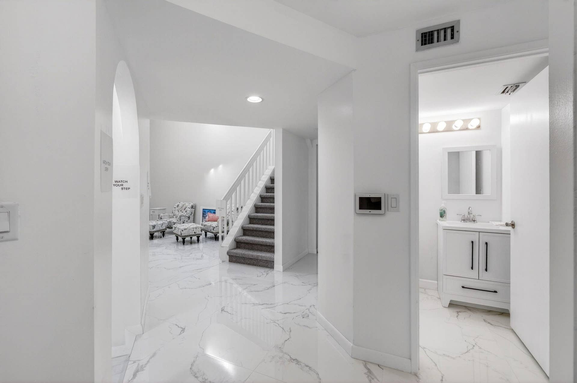 Foyer entry and half bath