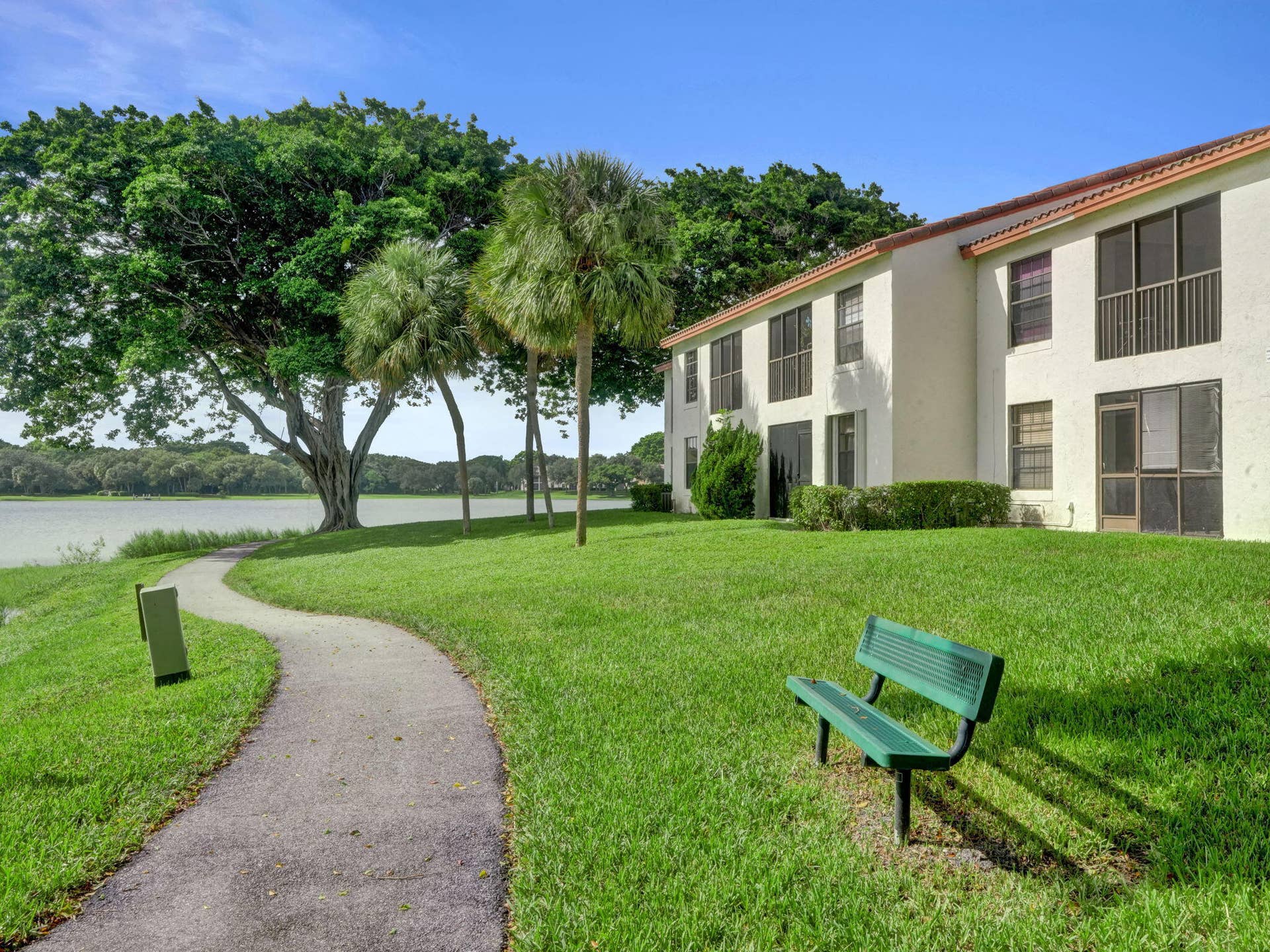 300 Palmwood Place, #P206, Boca Raton, FL 33431 Walking/jogging trails around community overlooking large serene lake