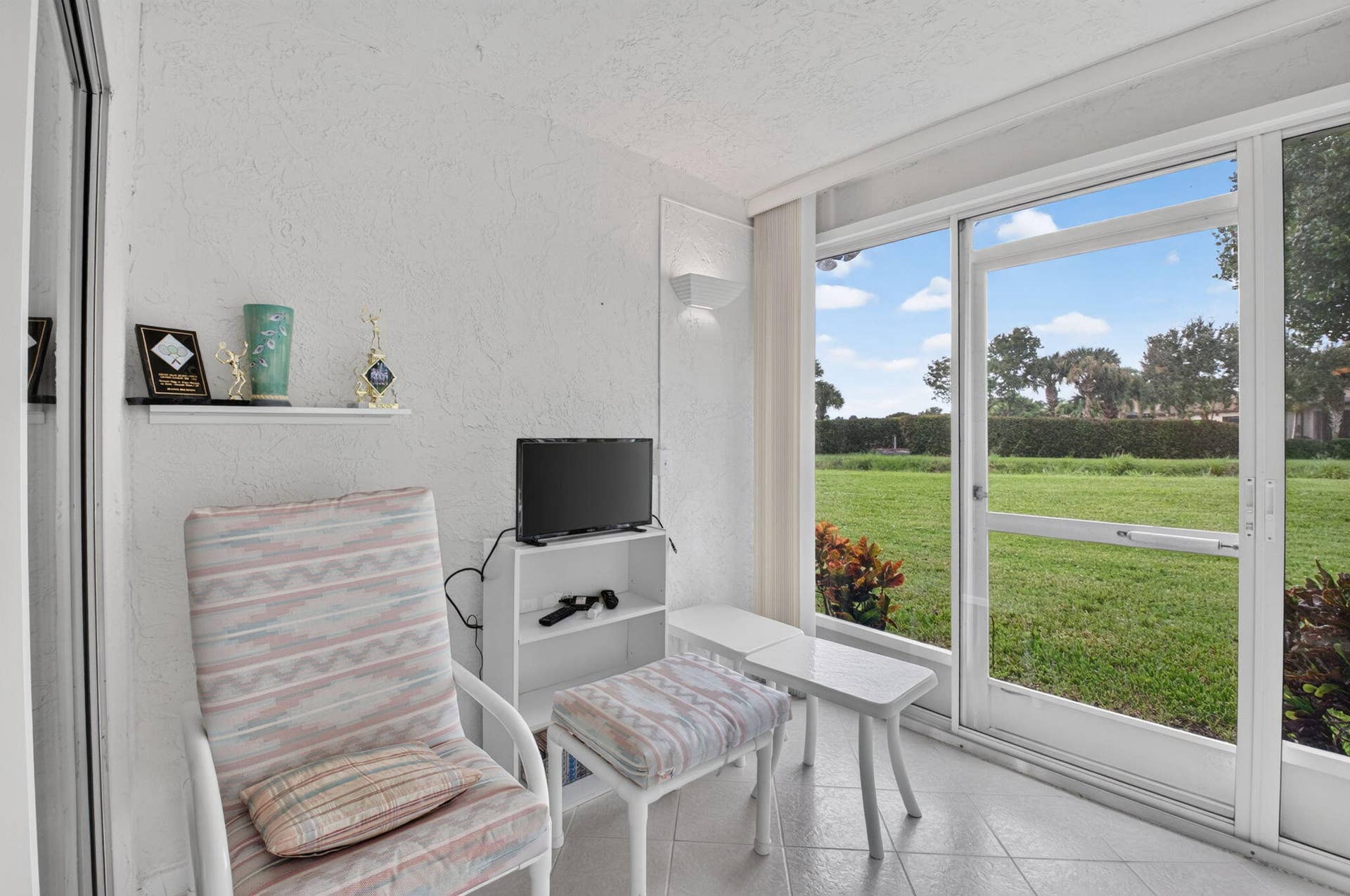 7700 CORAL LAKE Drive, Delray Beach, FL 33446 Enclosed Patio
