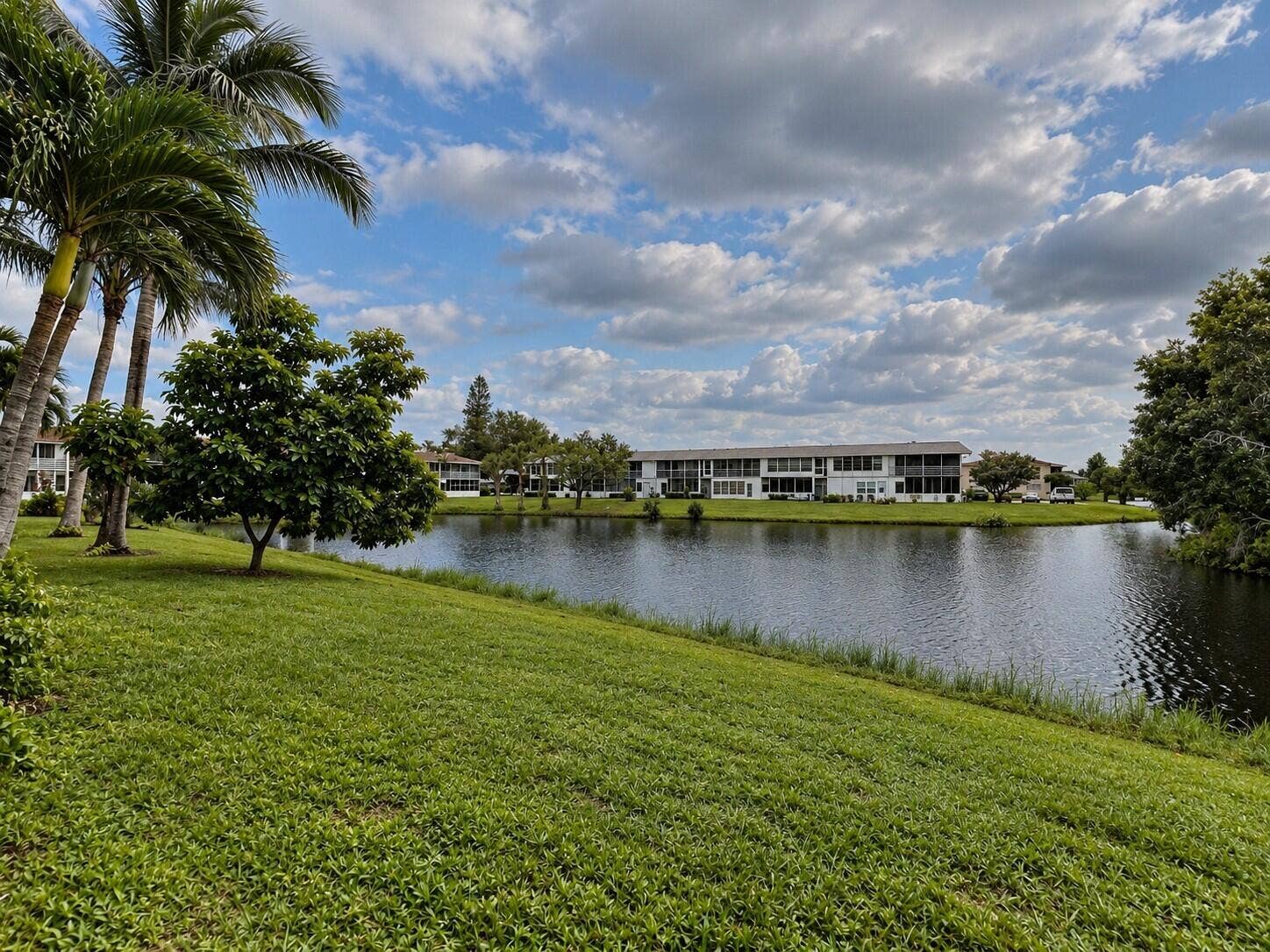 265 Northampton N, West Palm Beach, FL 33417 Enjoy Tranquil Water Views From This First Floor CORNER 2/1.5