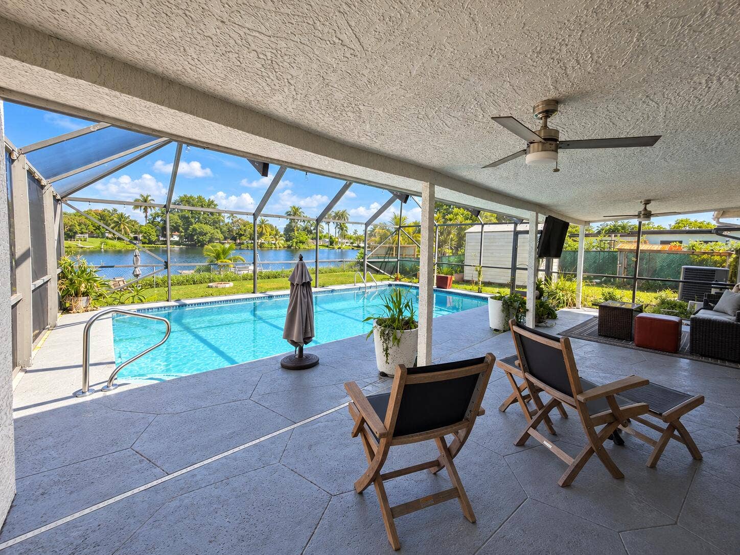 236 TAM O SHANTER Drive, Palm Springs, FL 33461 BAckpatiopoolview
