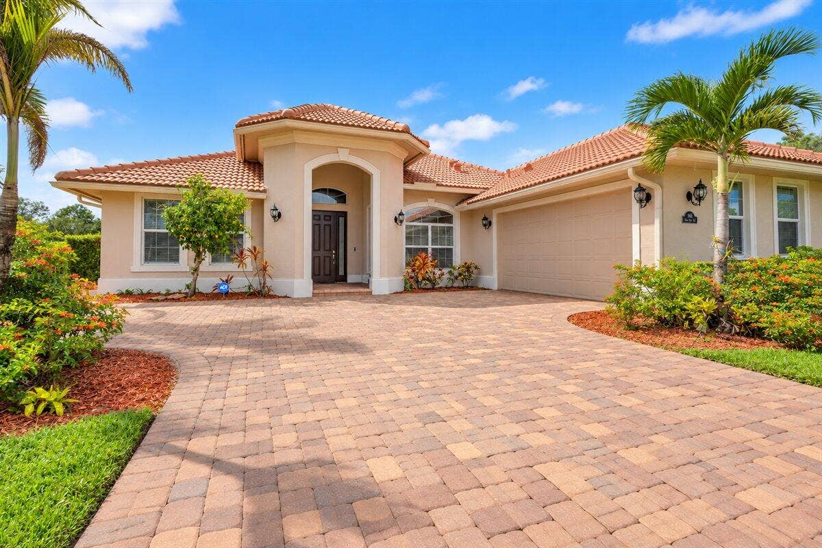Front Mediterranean Home with Tropic