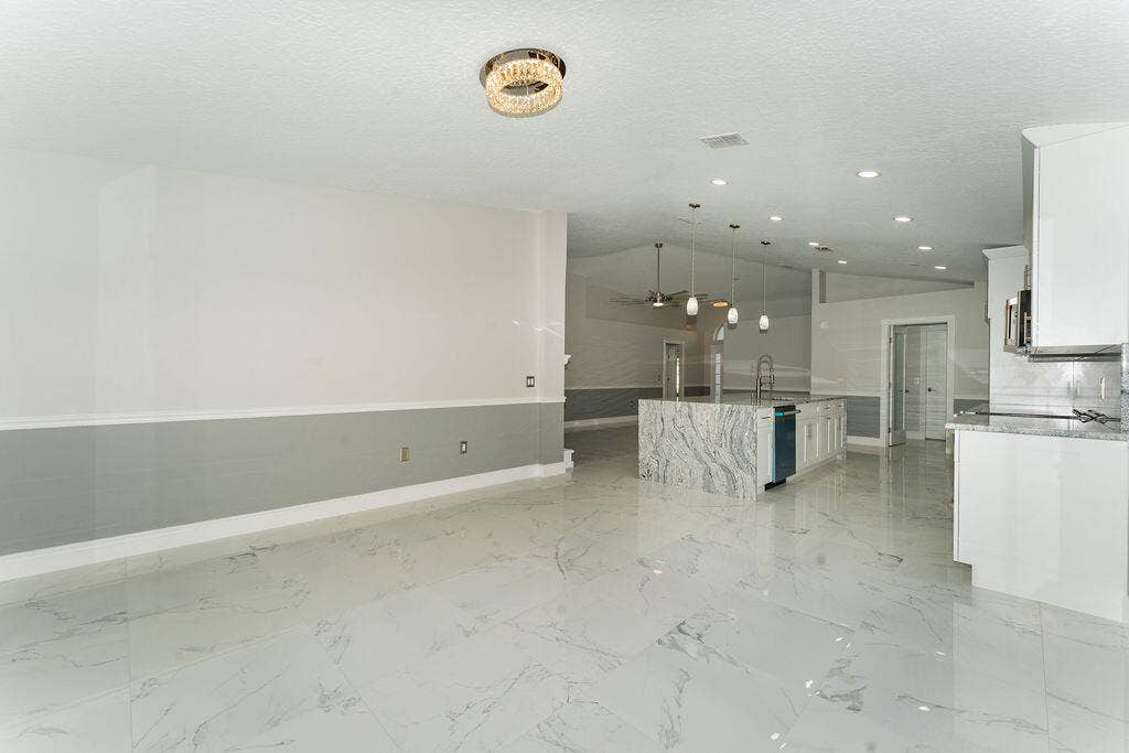 5138 NW WISK FERN Circle, Port St Lucie, FL 34986 The mill work throughout the property gives the home so much more charm and a beautiful contrast