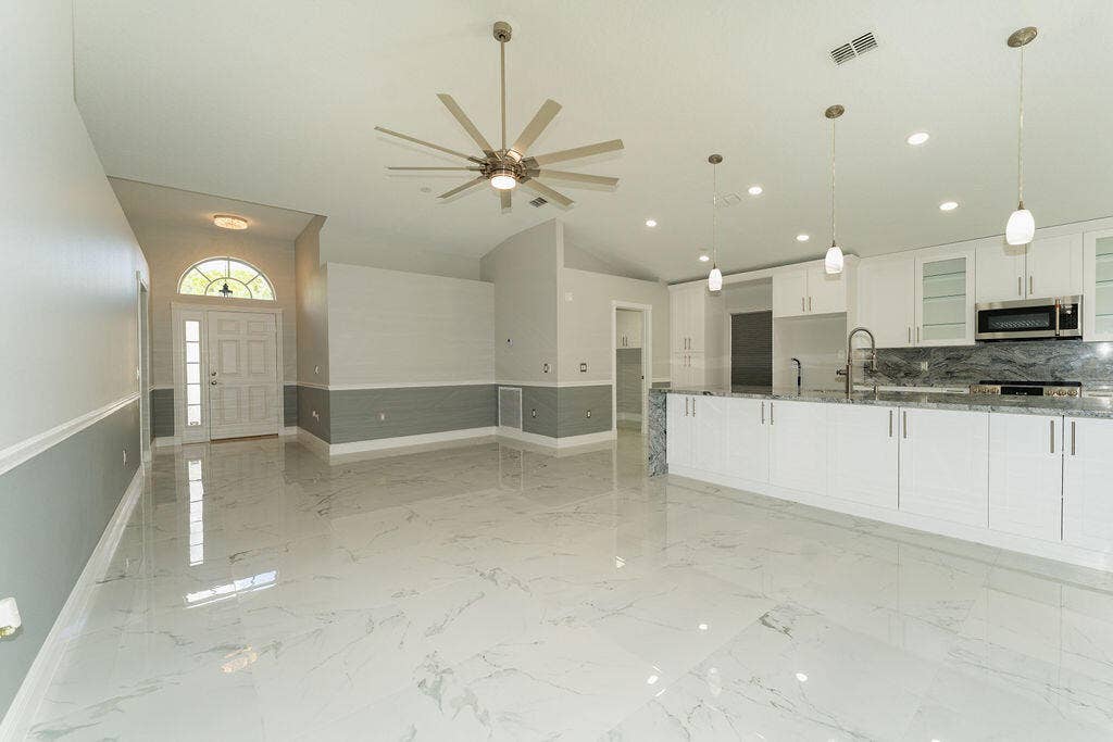 5138 NW WISK FERN Circle, Port St Lucie, FL 34986 Beautiful tile floors in every room. Professionally done.
