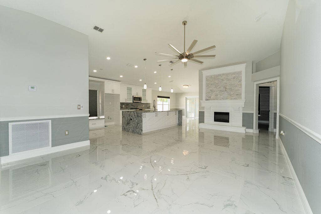 5138 NW WISK FERN Circle, Port St Lucie, FL 34986 Elegance and granite and cast stone come together very well