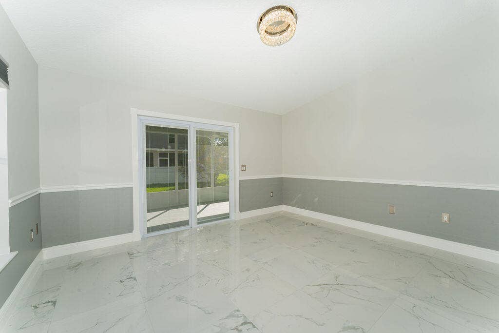 5138 NW WISK FERN Circle, Port St Lucie, FL 34986 Beautiful slider with built in blinds