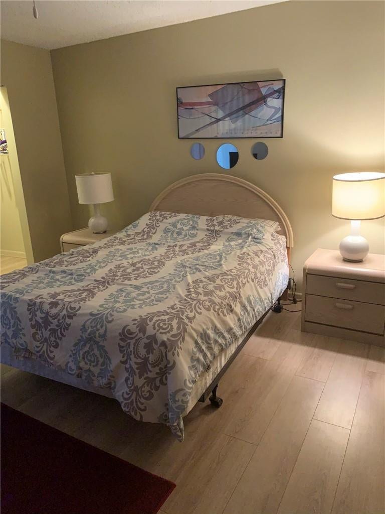 2305 LUCAYA Lane, #L4, Coconut Creek, Coconut Creek, FL 33066 Neutral wall finishes and light wood-finish flooring