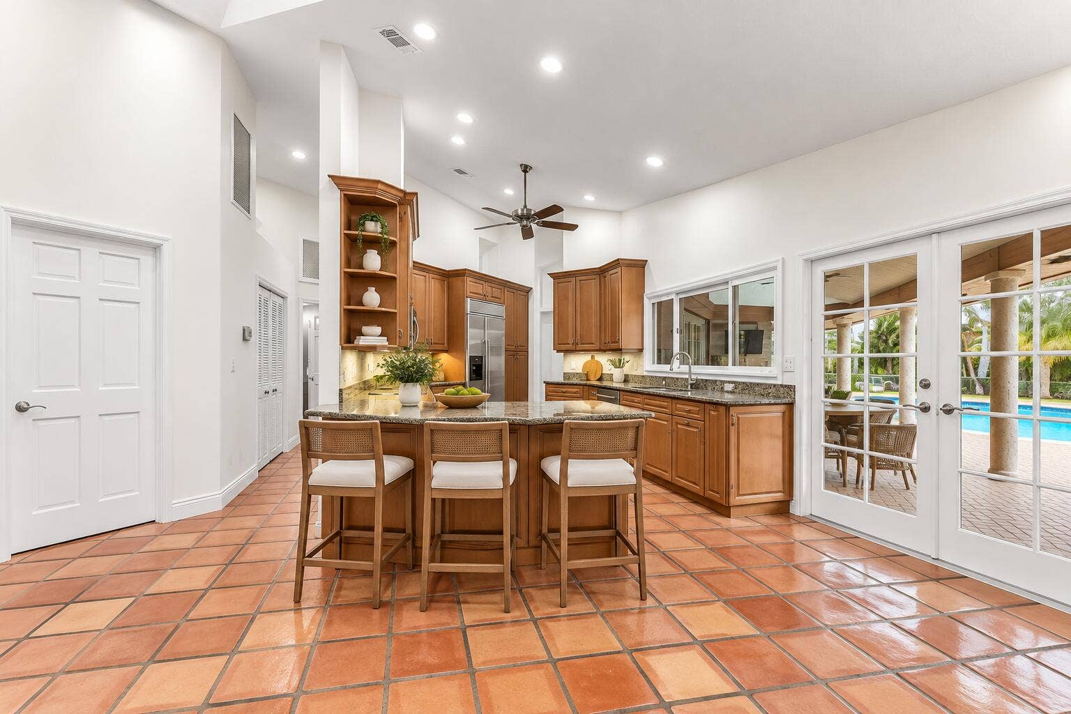 14757 HORSESHOE Trace, Wellington, FL 33414 Open Kitchen with French Doors to Pool