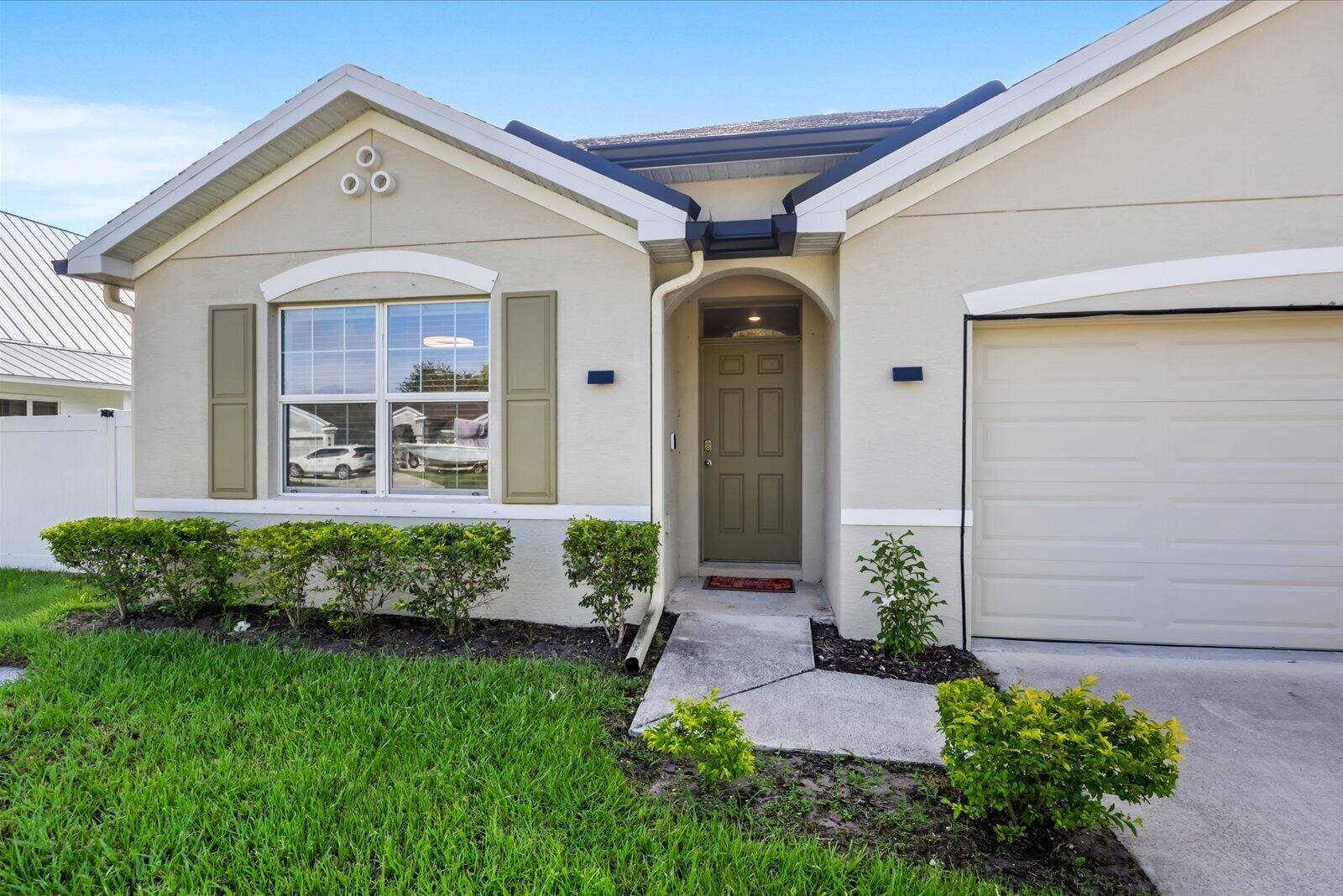 4589 SW Uleta Street, Port St Lucie, FL 34953 Front